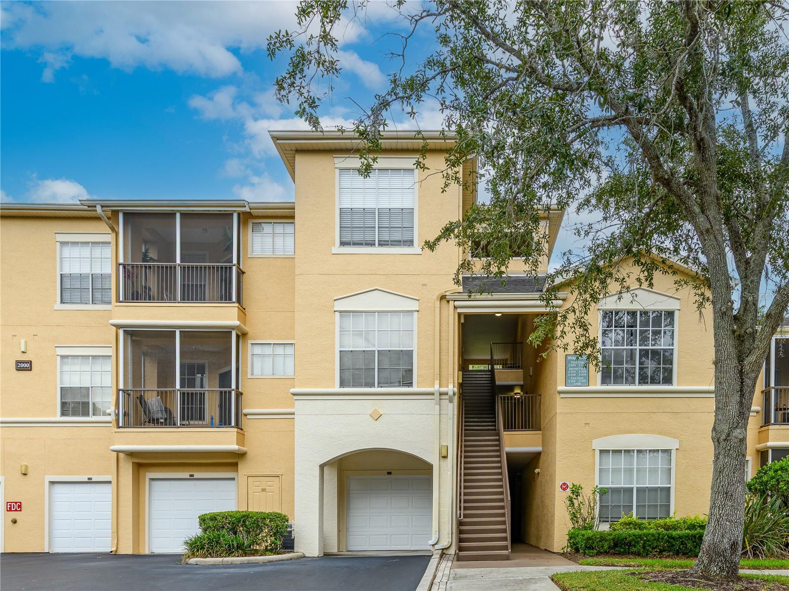 Immaculate 2-bedroom, 2-bath condominium located in the gated community of Oxford Place at Tampa Palms. This well-maintained second-floor unit features stainless steel appliances, a full-size washer and dryer, a beautifully remodeled bathroom, and new flooring throughout the main living areas. The split floor plan offers comfortable living, while the screened balcony overlooks a peaceful conservation area, providing a private setting to relax and unwind. A detached garage is also included for added convenience.

Residents of Oxford Place enjoy outstanding community amenities, including a resort-style pool, playground, EV charging stations, and a car wash station. Conveniently located near shopping, restaurants, Moffitt Cancer Center, the University of South Florida, and major highways.  Application fee is $75 per adult applicant. Lease administration fee of $150 is due upon application approval. HOA approval required prior to move-in. HOA application fee: $150 per person or married couple, refundable common area deposit: $250.