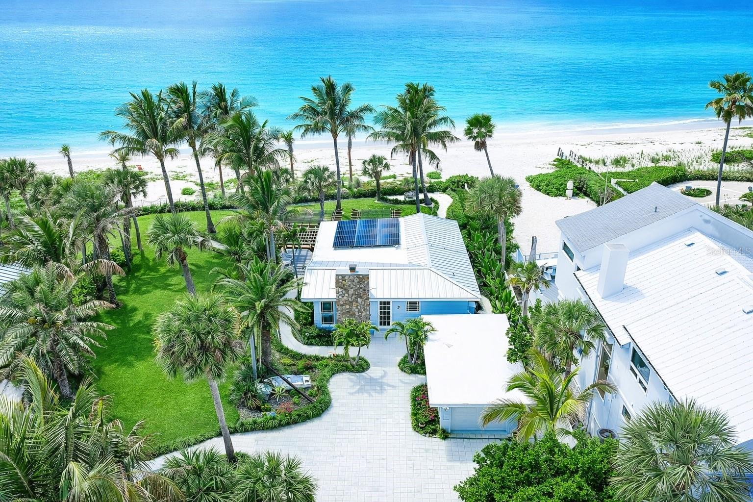 Rare Gulf-front offering with 100 feet of private sandy beach on approximately 0.75 acres, delivering exceptional privacy on one of Casey Key’s most coveted stretches. With no easements, the property offers a clean, uninterrupted canvas for future development or immediate enjoyment.
A charming, remodeled vintage cottage anchors the site, offering 2 bedrooms and 1,140 square feet—ideal as a beach retreat or interim residence while designing and building a larger Gulf-front estate.
The grounds are a lush botanical oasis, thoughtfully designed with multiple outdoor living elements including an open-air pool, gazebo, pavilion, and pergola—each positioned to capture Gulf breezes and the natural rhythm of the shoreline.
This is a rare combination of usable Gulf frontage, privacy, and scale—well-suited for a custom luxury residence with expansive outdoor living.
Located along the quiet, residential stretch of Casey Key, known for its low density and natural beauty, yet just minutes to the cultural and culinary offerings of Sarasota.
A compelling opportunity to create a legacy Gulf-front estate in one of the Gulf Coast’s most sought-after barrier island communities.