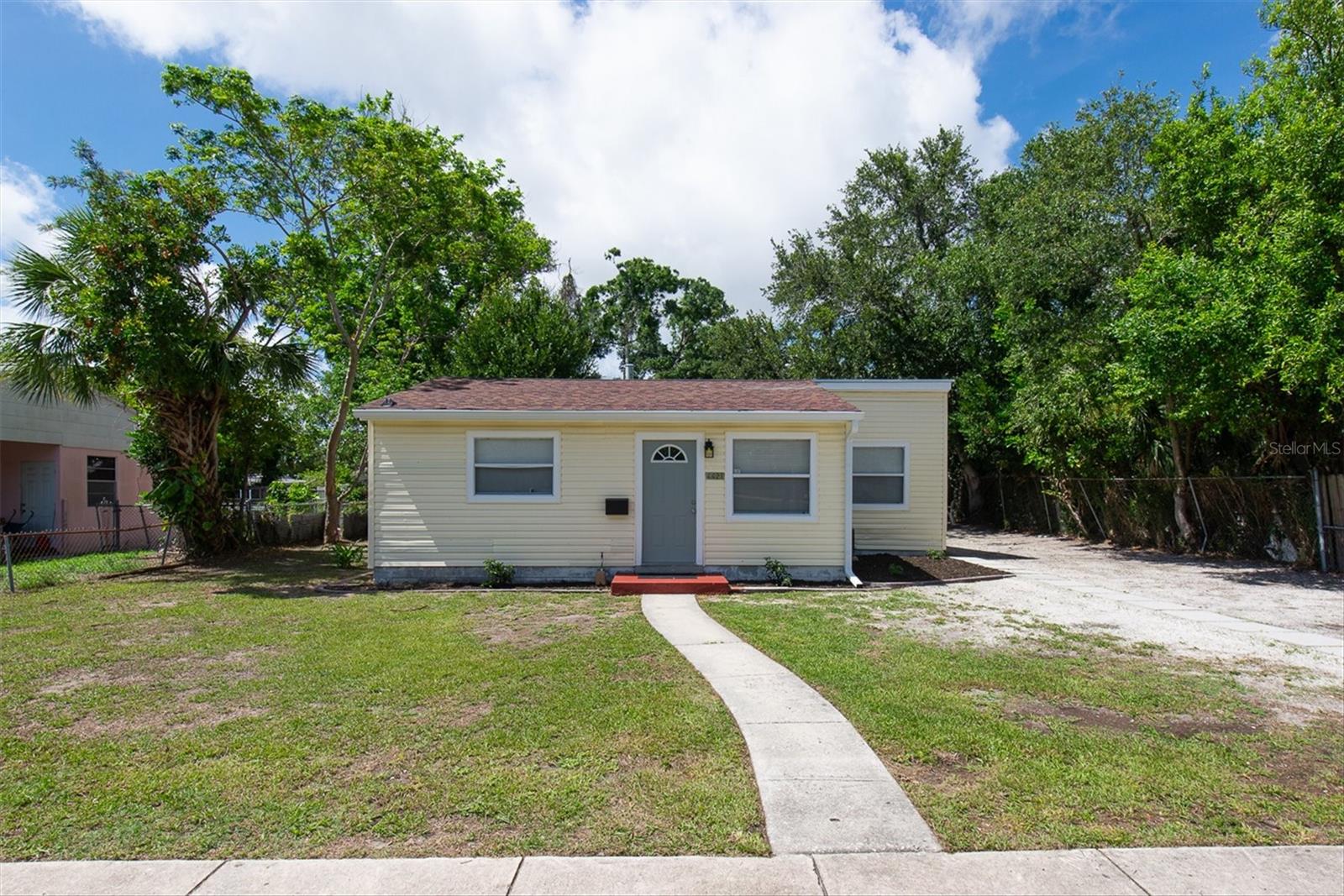 LOCATION LOCATION LOCATION! Sitting Just outside of GULFPORT! Only a few Minutes from Downtown Gulfport and Gulfport Beach! Welcome to this 3Bedroom 2Bath home that has been Tastefully Updated! Located in a HIGH and DRY area of St Pete! NON-Flood Zone. This home Features NEW Luxury Vinyl Flooring, NEW Appliances, Indoor Laundry hook-ups, has Central Air & a Newer AC, Updated Kitchen and Bathrooms, New Paint, NEW Fans, Newer Water Heater, and Much More!! Has a really big backyard and a big drive-way that can accommodate up to 3 cars. No neighbors across from you, Instead you are right across from a Park and Rec Center that has a Kid's Playground, Swimming Pools, BasketBall Courts, Tennis Courts and PICKLEBALL COURTS! The Pinellas Biking Trail is right around the corner from this home.Centrally Located between Desirable Downtown St Pete and our famous sugar sand Beaches, this South Central area is St Pete’s best kept secret! Less than 10mins to Downtown St.Pete & less than 10 mins away from the St Pete Beach and Treasure Island. Near Shopping and Dining and Only 25mins from Tampa International Airport. PET Friendly!!