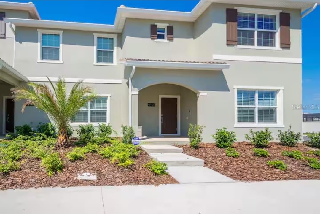 Welcome to resort-style living in the highly sought-after Storey Lake Resort! This beautifully fully furnished home is tastefully decorated with stylish, modern décor and offers the perfect combination of comfort, luxury, and investment potential. Whether you're searching for a  vacation home, or income-producing short-term rental, this property checks all the boxes. Step inside to discover an open-concept floor plan designed for entertaining, where the spacious living area flows seamlessly into the modern kitchen and dining space. The kitchen offers ample cabinetry, generous counter space, and overlooks the main living areas, creating the perfect gathering place for family and guests. The spacious bedrooms provide comfortable accommodations, while the primary suite serves as a private retreat complete with an en-suite bathroom and generous closet space. Step outside to your own private screened plunge pool, the perfect place to relax after a day at the theme parks or enjoy Florida's year-round sunshine in complete privacy. Located in one of Central Florida's premier vacation destinations, Storey Lake Resort offers exceptional amenities including a resort-style pool, lazy river, water slides, splash pad, fitness center, mini golf, sports courts, kayak rentals, clubhouse, tiki bar, and more. Just minutes from Walt Disney World, Universal Orlando Resort, SeaWorld, world-class shopping, dining, and Orlando International Airport, this location is ideal for both vacationers and full-time residents. With short-term rentals permitted, HOA covering cable TV, Internet and Trash service along with the home being sold fully furnished, this is a true turnkey opportunity ready for immediate enjoyment or rental income. Don't miss your chance to own a beautifully appointed townhome in one of Kissimmee's most desirable resort communities.
