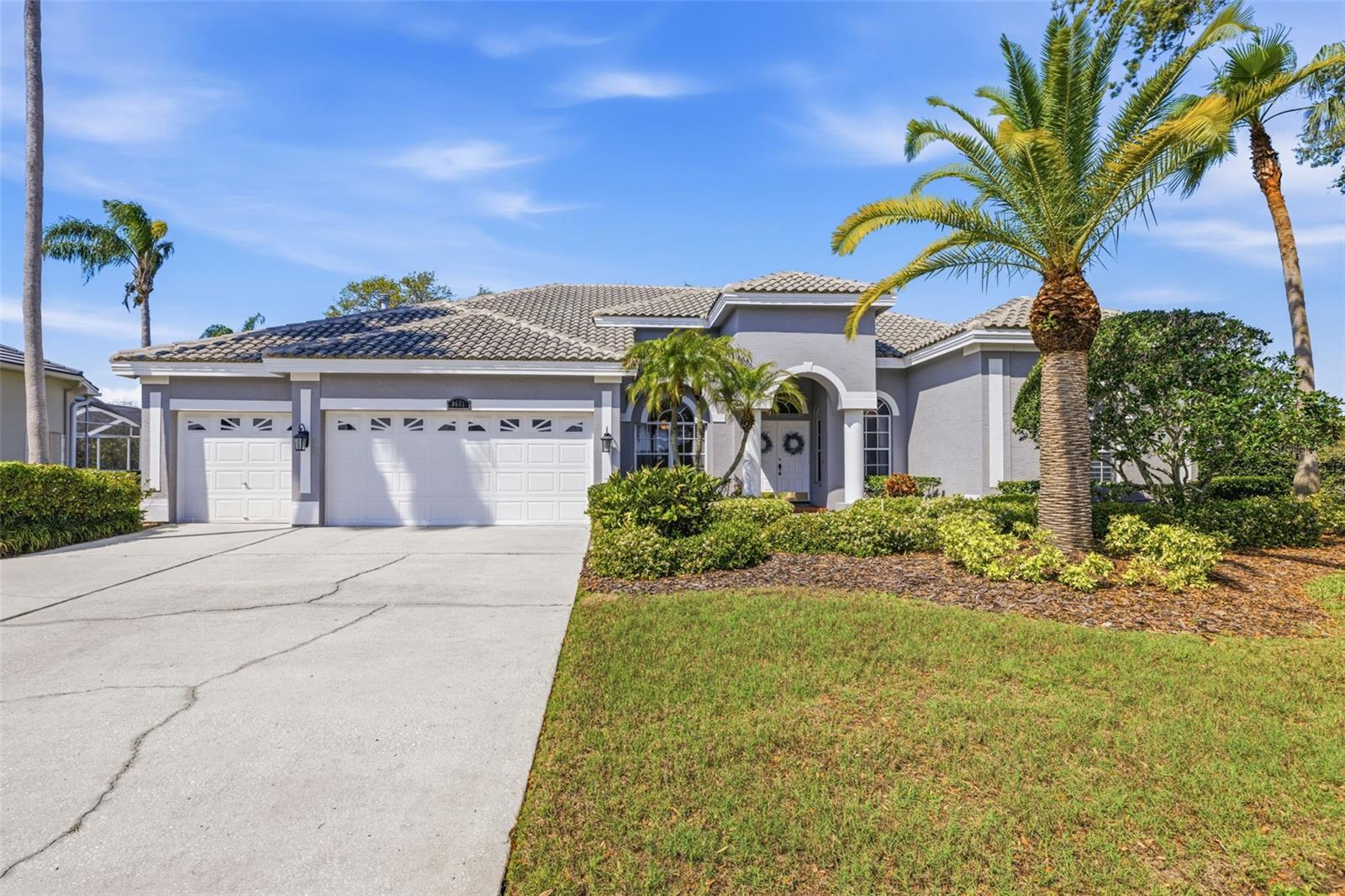 Welcome to the highly sought-after Trinity area, just moments from Fox Hollow Golf Course, where this beautifully maintained home is tucked inside the exclusive gated community of Inverrary at the Villages of Fox Hollow West. Situated on over a quarter acre, this 4 bedroom, 3 bathroom, 3 car garage home offers more than 3,100 square feet of thoughtfully designed living space with exceptional curb appeal and a layout that truly delivers. Located in a non- flood zone, this home also benefits from low HOA fees, no CDD, and no required flood insurance. Stepping inside, you are immediately greeted by high ceilings, porcelain and wood-look ceramic tile flooring, and an open, airy feel throughout the main living spaces. The layout is ideal for both everyday living and entertaining, with a formal living and dining area featuring crown molding, along with a spacious family room that seamlessly connects to the kitchen. The kitchen is a standout, complete with quartz countertops and backsplash, real wood cabinetry, a large stainless steel sink, recessed lighting, and a full suite of stainless steel appliances including a Wolf gas cooktop with downdraft venting, double wall ovens, refrigerator, and newer dishwasher. Just off the kitchen, a large utility and laundry room offers additional storage and convenience. The split bedroom floorplan provides privacy, with all bedrooms located downstairs and a large bonus room upstairs, perfect for a media room, playroom, or additional living space. A front office or den adds even more flexibility to the layout. The spacious primary suite is a true retreat, featuring double walk-in closets and an ensuite bathroom with plantation shutters on the window allowing plenty of natural light, dual vanities, a soaking tub, and a separate walk-in shower. All bedrooms offer generous closet space, and the home is filled with storage throughout, including a dedicated storage room under the stairs. Indoor and outdoor living blend seamlessly with multiple sets of sliding glass doors that fully open from both the family room and dining room to the screened-in pool and covered patio area. The pool and deck were resurfaced approximately four years ago, with a newer pool vacuum and equipment that will convey, along with an automatic chlorinator. The oversized backyard and screened enclosure create a private outdoor oasis perfect for relaxing or entertaining year-round. Additional features include a water softener system, reverse osmosis system at the kitchen sink, irrigation system with recent maintenance, a 2023 hot water heater, and two A/C condensers providing four separate temperature zones throughout the home. Gas service supports the home heating system, the cooktop, dryer, and hot water heater for added efficiency. Residents enjoy access to the Fox Hollow Clubhouse, The Grille restaurant, and optional membership to the Robert Trent Jones designed Fox Hollow Golf Course. Ideally located near top-rated schools, shopping, dining, parks, and medical facilities, with convenient access to Mitchell Plaza, the Tarpon Springs Sponge Docks, Tampa International Airport, and the Gulf Coast’s beautiful beaches. This home offers something for everyone, schedule your showing today!