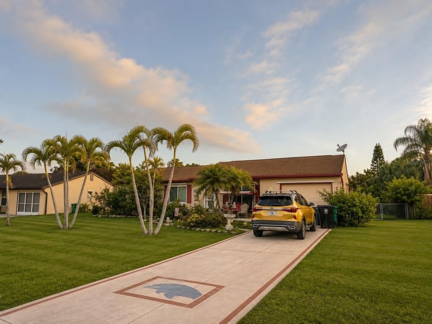 Welcome to this charming 3-bedroom, 2-bath home in the heart of Port St. Lucie! Offering 1,176 square feet of comfortable living space, this well-maintained home is packed with features that provide both peace of mind and versatility.

The front windows have all been replaced within the last year, enhancing energy efficiency and curb appeal, while storm shutters for every window offer added protection during Florida’s storm season. Enjoy Florida living year-round from the spacious screened enclosure overlooking the large, flat backyard—perfect for entertaining, relaxing, or creating your own outdoor oasis. A welcoming front patio and additional back patio provide even more space to enjoy the outdoors.

Need extra space? The office/workshop located just off the screened enclosure offers endless possibilities. Whether you’re looking for a home office, hobby room, workshop, or potential fourth bedroom, this flexible space can easily adapt to your needs.

Conveniently located near shopping, dining, parks, schools, and the beautiful Treasure Coast beaches, this home offers incredible potential for its next owner. Being sold as-is, it’s a fantastic opportunity for buyers looking to personalize a home and make it their own. Don’t miss your chance to see all this property has to offer!