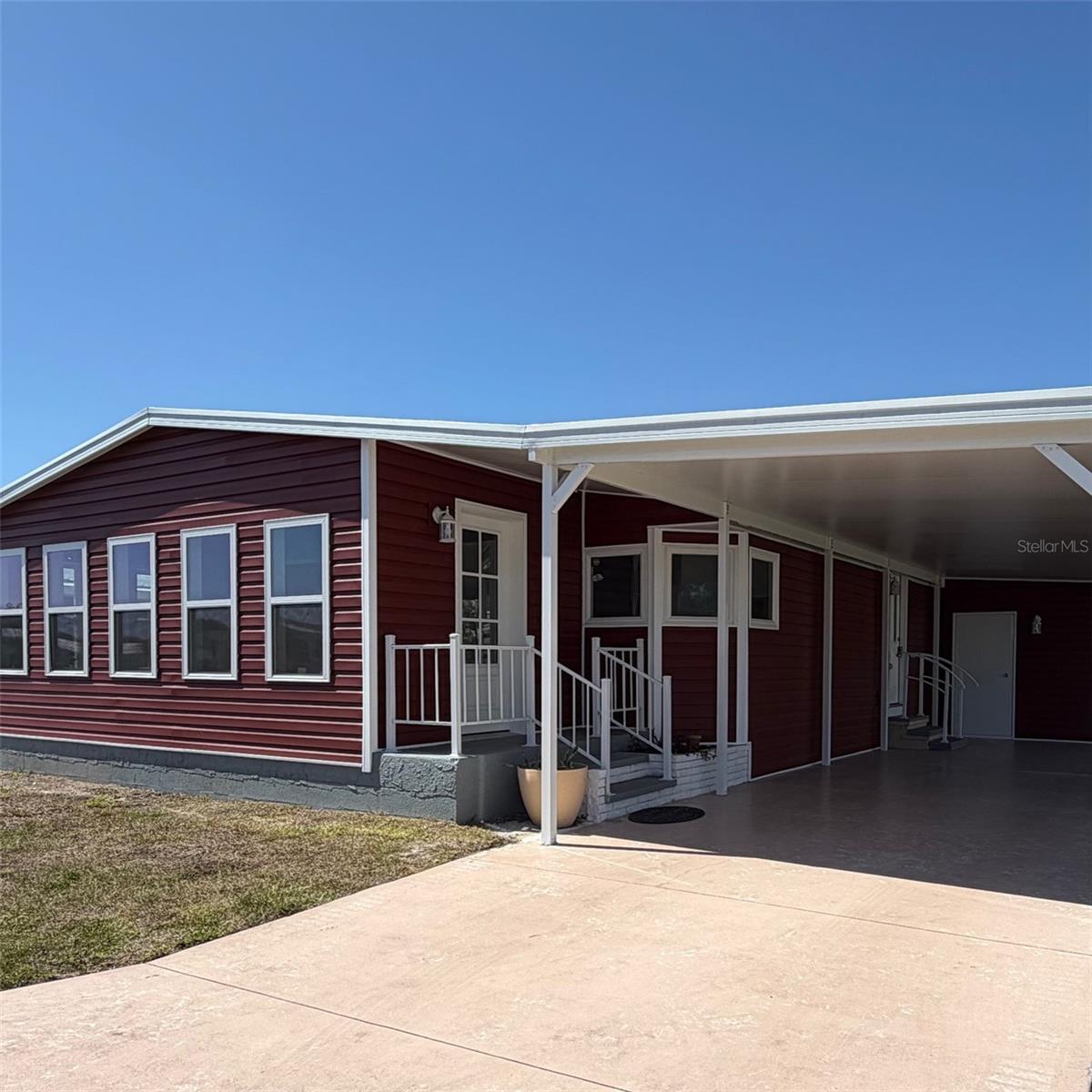 Step into this amazingly refurbished red home with crisp white trim, truly better than new and full of thoughtful upgrades throughout. From the moment you arrive, the charming front porch—featuring seven double-hung windows—invites you to relax and enjoy the Florida lifestyle.

Inside, you’ll find a stunning, state-of-the-art kitchen designed for both beauty and function, along with a spacious layout that includes an inviting living area and an impressive main ensuite bath. Every detail has been carefully updated, including a new electrical panel, fresh interior paint, and a new roof with warranty, offering peace of mind for years to come.

Additional highlights include inside laundry, a brand-new carport, and a convenient storage shed, making everyday living easy and efficient.

Located in the highly desirable Sandalwood Park, this community is known for its friendly atmosphere and active lifestyle. Residents enjoy a large heated and cooled pool, social gatherings, a dog park, and a variety of activities to stay engaged and connected.

Perfectly situated between Venice Avenue and Center Road, you’re just minutes from medical facilities, restaurants, shopping, and the beach. The park itself offers extra space between homes, adding to the sense of comfort and privacy.

This is a rare opportunity to own a beautifully updated home in one of the area’s most sought-after communities.