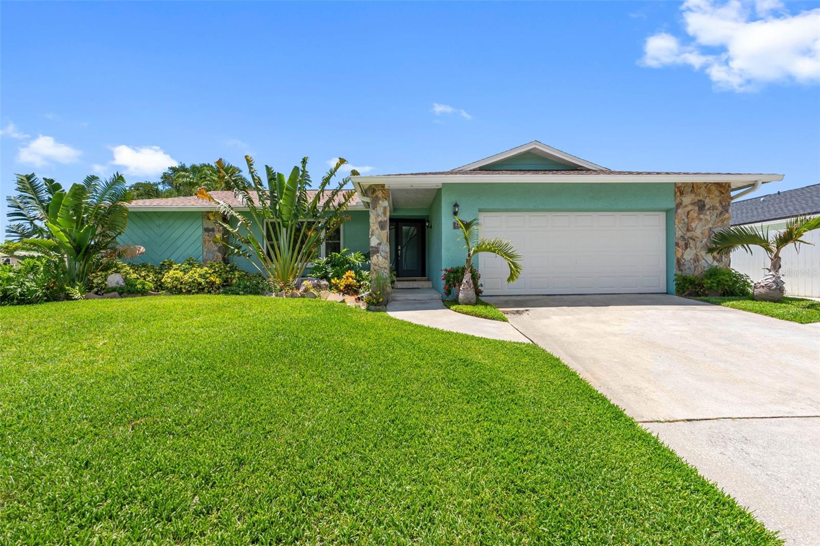 Experience the perfect blend of modern efficiency and Florida charm in this stunning, fully updated Seminole residence. Nestled in a highly desirable non-flood zone just minutes from the beach, this exceptional property offers the feel of new construction without the wait and with no HOA dues.

A comprehensive 2020 renovation included a new roof, HVAC system, refrigerator, dishwasher, and washer/dryer set. In 2022, the home was further enhanced with a state-of-the-art solar energy system that typically keeps electric bills under $40 per month year-round.

Inside, the desirable split floor plan maximizes privacy and flow, featuring luxury vinyl flooring throughout, granite countertops, stainless steel appliances, crown molding, custom barn doors, and a cozy fireplace. Top-tier hurricane-rated entry and sliding glass doors provide added security and peace of mind.
Step outside to your private backyard oasis, complete with tropical landscaping, vinyl fencing, a pool, screened porch, and spacious pool deck. A power retractable awning provides shade at the touch of a button, creating the perfect space for entertaining or relaxing in the Florida sunshine.

Combining extensive upgrades, exceptional energy efficiency, and an unbeatable location just minutes from the coast, this is a rare opportunity to own one of Seminole's most impressive move-in-ready homes.