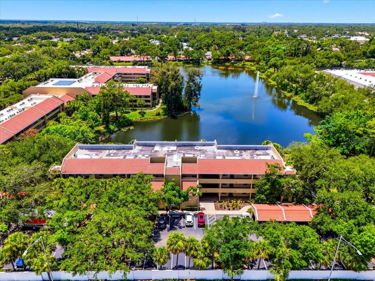 American House Sarasota: Luxury 55+ Independent Living in the Heart of Sarasota, a warm, pet-friendly community set on 18 wooded acres where comfort and connection come first. Here, you’ll enjoy a vibrant, maintenance-free lifestyle filled with rich friendships and engaging activities, in a luxury setting designed around you. Residents enjoy resort-style amenities including an in-ground pool and a scenic walking path circling the lake, complete with shaded trees, and tranquil seating areas. Our landscaped outdoor terrace offers even more space to relax and connect with neighbors. Inside, you’ll find a fitness center, dedicated health and wellness care, formal and casual dining rooms, a dedicated salon, and a welcoming family room for gathering with loved ones. Effortless Living: Every monthly rental fee includes all utilities, cable, and Wi-Fi, along with three chef-prepared meals per day featuring culinary-inspired dining. Weekly housekeeping and transportation are included, so you can spend your time on what matters most. Apartments feature stainless steel appliances, laminate flooring, and contemporary cabinetry. One and two-bedroom layouts are available, with short-term leases offered for added flexibility. Pets are welcome, with a one-time fee of $1,000 for up to two pets (20 lbs each). An Award-Winning Gulf Coast Location: Just off Bee Ridge Road, American House Sarasota keeps you close to everything that makes this city special. Siesta Key, Longboat Key, St. Armands Circle, and Lakewood Ranch are all minutes away, along with the Ringling Museum, Marie Selby Botanical Gardens, and Mote Marine Aquarium. Enjoy nearby shopping and cafés at University Town Center, and easy access to outdoor paths like the Legacy Trail and Urfer Family Park. Sarasota Memorial Hospital is close by, and the community is easily reached via US-41 and I-75. In addition to independent living, American House Sarasota also offers assisted living and memory care, providing a peaceful, familiar setting and personal guidance for residents and their loved ones through every stage of the journey. Sarasota’s sunshine, culture, and coastal charm make this a beautiful place to enjoy life, surrounded by caring staff and friendly neighbors who feel like family. Please note: pictures and floor plans may not represent the exact unit selected. Measurements and room sizes vary by unit and may not be exact.