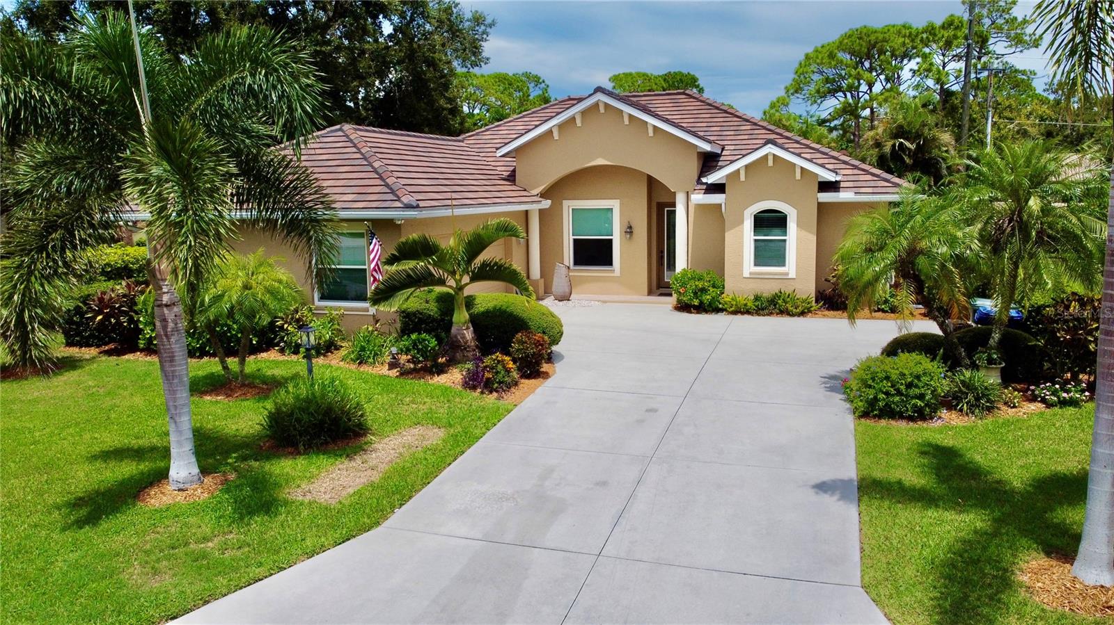 Located in the highly desired Park Trace Estates, this beautifully maintained 4-bedroom pool home sits on a premium corner lot and is truly move-in ready. Recent upgrades include a NEW TILE ROOF and IMPACT WINDOWS, offering peace of mind and energy efficiency. The entire house has a LEAFHOME WATER FILTRATION SYSTEM, ensuring clean, high-quality water throughout.  The spacious layout is perfect for both everyday living and entertaining, with seamless indoor-outdoor flow to the private SALT WATER POOL. Enjoy mature landscaping on the large corner lot providing added space and privacy, with plenty of room to enjoy the beautiful surroundings. Park Trace Estates has low HOA fees, and is in a prime location close to top-rated schools, shopping, restaurants, Legacy Trail, Oscar Scherer State Park, and Gulf Coast beaches.