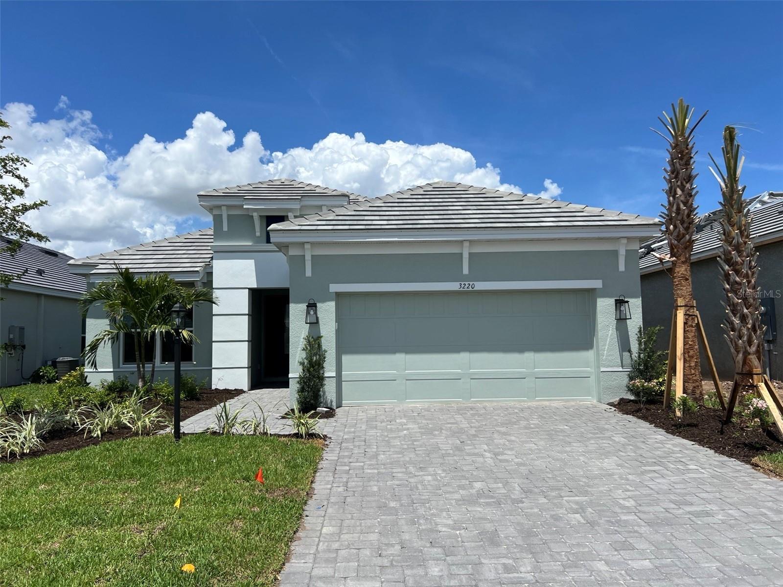 Under Construction. What's Special: High Ceiling | East Facing Lot | Large Kitchen Island | Gourmet Kitchen. New Construction - August Completion! Built by America's Most Trusted Home Builder. Welcome to the Lazio at 3220 Vicenza Court in Esplanade at Azario Lakewood Ranch! This new home shines with bright, open living spaces that feel welcoming from the moment you step into the foyer, where a private study sits just to the left. The foyer also opens to a dining area and spacious great room, creating an easy flow for everyday living and entertaining. Across from the study, a secondary bedroom features a walk-in closet and a private full bathroom, while another secondary bedroom near the entry is paired with a full bath just outside the door. The designer kitchen offers a large island overlooking the great room, with sliding glass doors that lead to an expansive lanai for effortless indoor and outdoor living. Tucked away for privacy, the primary suite includes bay windows, a generous walk-in closet, and a spa-inspired bath with a large shower. Additional Highlights Include: gourmet kitchen with casual dining, tray ceiling package, 10' ceilings, extended covered lanai, tandem garage, outdoor kitchen rough-in, under cabinet lighting, pool and spa pre-wire, and 8' interior doors. Photos are for representative purposes only. MLS#A4688647

Resort-Style Living in Esplanade at Azario Lakewood Ranch, the perfect blend of relaxation and recreation! Enjoy the heated resort-style pool, state-of-the-art fitness center, and energizing aerobics classes. For outdoor enthusiasts, there are pickleball courts, scenic trails, Vitality Park, and if golf is your game, you'll love Esplanade's 18-hole championship course! Unwind with a facial massage or by the fire pit after a workout. Exclusive amenities like a Wellness Center, Culinary Center, and sports courts ensure there's something for everyone, whether you want to stay active or relax in style.