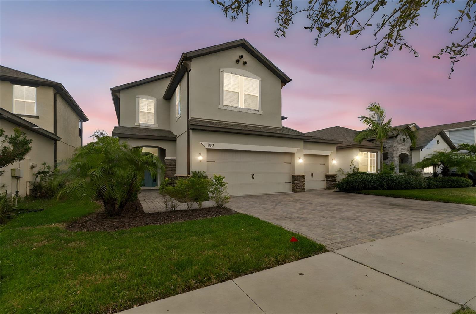 11512 Navel Orange Way is a newer, beautuiful, GATED single-family home located in the highly desirable Reserve at Citrus Park / Westchase area. Built in 2020, this spacious two-story property offers modern masonry/stucco architecture, 4 bedrooms, 3 full bathrooms, and a substantial 2,940 square feet of living space sitting on a 6,098 square foot lot.  Step inside to discover an airy, light-filled layout showcasing superior construction with a durable concrete block foundation and energy-efficient elements. The open-concept lower level flows gracefully into a chef’s kitchen with central climate controls to keep you comfortable year-round. Upstairs offers great versatility for a game room, home theater, or workspace. Nestled inside a highly desirable pocket of 33626 - Enjoy incredibly low HOA dues and NO CDD fees. This property delivers absolute peace of mind with a minimal flood risk profile. Don't miss your chance to own a nearly-new gem of just under six years! Don't forget to ASK your Realtor or ME  Don't forget... one of Tampa's hottest zip codes!  Amazing Schools!  Please ASK your Realtor for the Features List - It'll WOW you!  If you are not working with someone - I'm happy to give them to you as well!