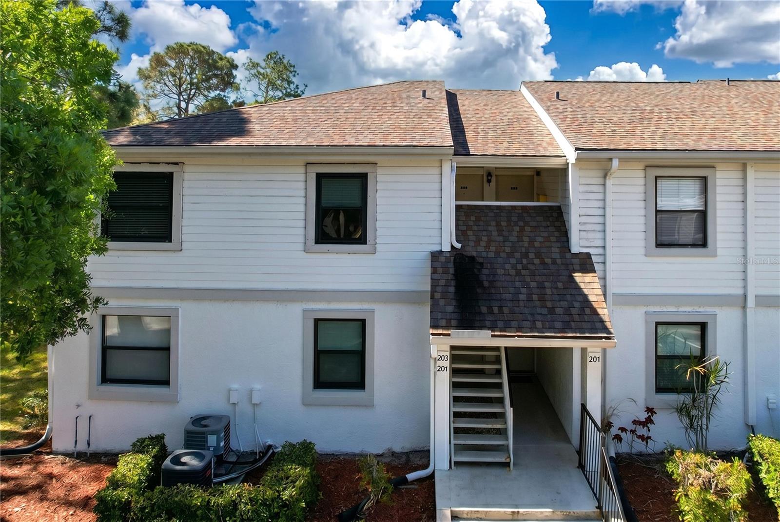 MEADOWS CONDO UNIT TWO AT EAST LAKE WOODLANDS THE - Residential