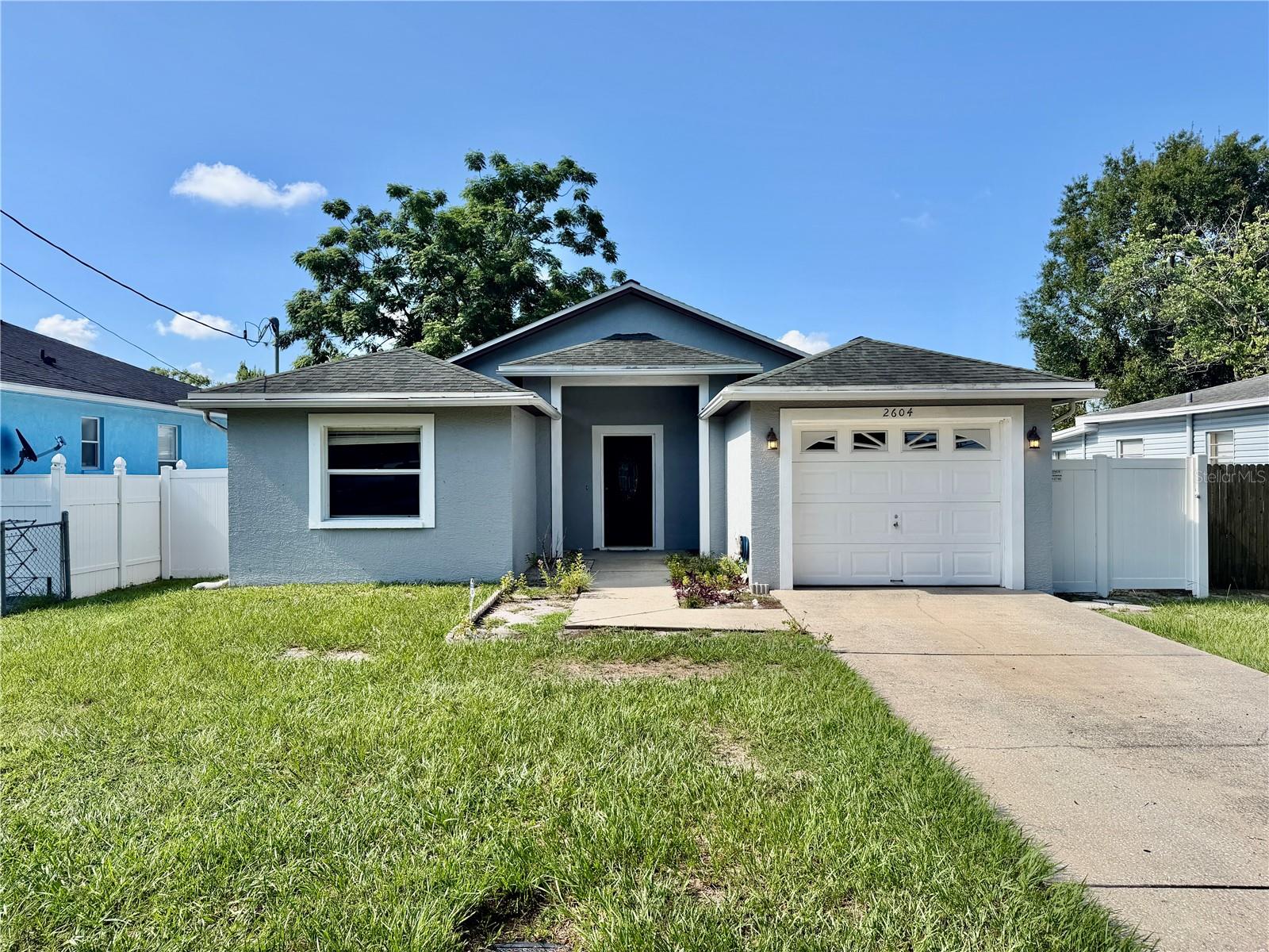 Welcome to this beautifully updated home in the heart of Tampa. With 3 bedrooms, 2 renovated bathrooms, and a one-car garage, this move-in-ready house blends modern upgrades with everyday comfort. Inside, you'll find luxury vinyl flooring, an open layout with lots of natural light, and a kitchen with quartz countertops, solid wood cabinets, and modern finishes. Recent updates include a newer roof, AC system, energy-efficient windows, and fresh paint inside and out, giving you peace of mind. Step outside to a fully fenced backyard with lots of space for gatherings, pets, or simply relaxing in the Florida sun. The oversized lot is easy to maintain and offers many options for use. This home is just minutes from Tampa International Airport, International Plaza, parks, restaurants, shopping, and major highways, so you have easy access to everything Tampa offers. With its great style, location, and value, this is an opportunity you won't want to miss.