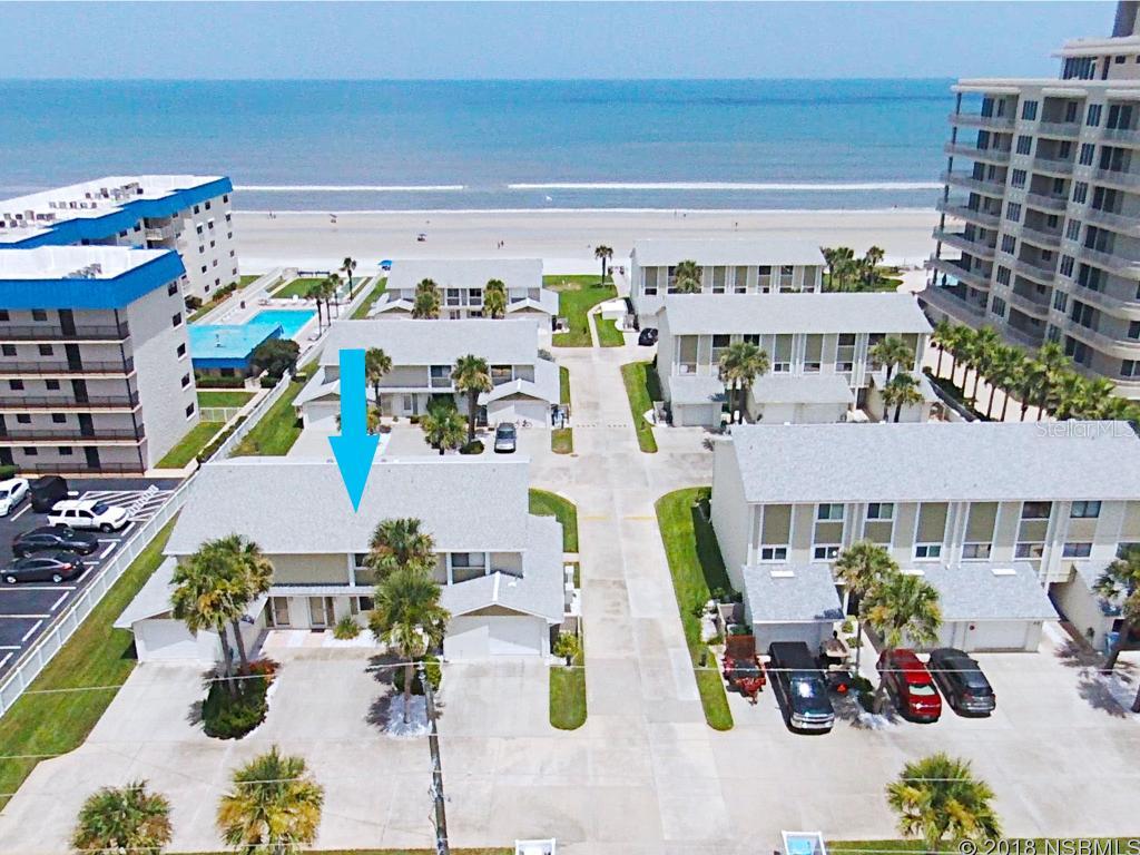 OCEANFRONT COMPLEX -  NEWLY REMODELED AND NEWLY FURNISHED WITH BRIGHT BEACHY DECOR!!  THIS HUGE, 2- BDRM, 2-1/2-BATH TOWNHOME HAS TWO MASTER SUITES WITH ENSUITE BATHS, AND AN ABUNDANCE OF CLOSETS AND STORAGE. UPDATES AND IMPROVEMENTS INCLUDE: NEW WINDOWS THROUGHOUT, NEW SLIDING DOORS, NEW FLOORS;  NEW REMODELED KITCHEN WITH NEW WOOD CABINETS AND BEAUTIFUL GRANITE COUNTERS, TRACK LIGHTING,  STAINLESS WASHER, DRYER, REFRIGERATOR, RANGE, DISHWASHER & MICROWAVE; ALL 3 BATHS UPDATED WITH NEW FIXTURES, VANITIES & COMMODES; NEW CEILING FANS THROUGHOUT, AND NEWLY PAINTED IN BRIGHT BEACHY COLORS.  HURRICANE SHUTTERS FOR YOUR PROTECTION, AND NEW AC IN 2017. AMENITIES INCLUDE LARGE  POOL, AND LOTS OF GREEN SPACE TO WALK OR JUST SIT AND ENJOY WONDERFUL OCEAN BREEZES. THE HOA IS PET FRIENDLY AND IS GREAT FOR SHORT TERM (1-WEEK) OR LONG TERM RENTALS.   THE CAR-FREE BEACH IS A WONDERFUL PLACE FOR FAMILIES TO ENJOY OUR AMAZING NSB BEACH! LIFE IS GOOD HERE - LIVE AT THE BEACH, WITH A SHORT WALK OR DRIVE TO GREAT RESTAURANTS, SHOPPING AND MANY ACTIVITIES AVAILABLE IN NEW SMYRNA BEACH! CHECK OUT ATTACHED VIRTUAL TOUR FOR FLOOR PLAN, ETC.  (ALL INFORMATION INTENDED TO BE ACCURATE BUT SHOULD BE VERIFIED BY BUYER AGENT.) ;Water: City