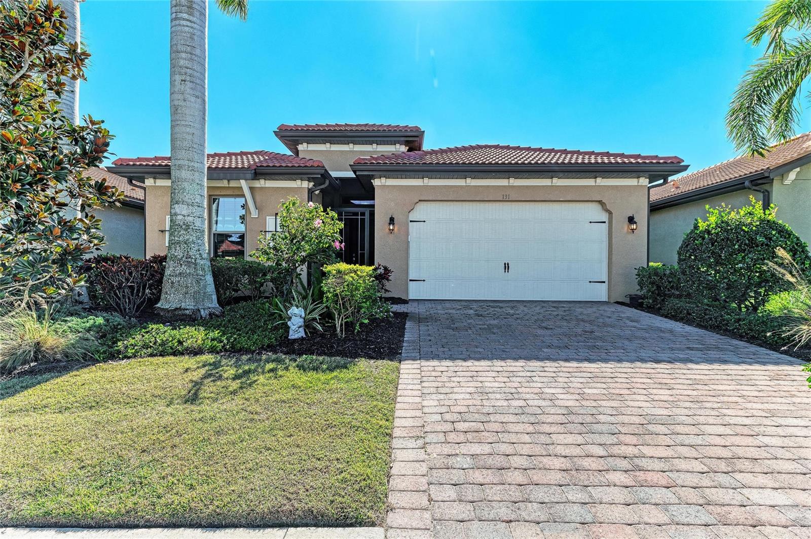 This beautifully upgraded, well-maintained, and fully furnished home is ready for you to move right in and start enjoying the incredible Florida lifestyle. Welcome to your dream home at Toscana Isles, where resort-style living meets modern elegance!  This popular Edison floor plan features three generous bedrooms plus a cozy den, all situated on a spacious and private homesite with plenty of room to add a pool if you desire, or just take a short walk to the community's resort style pool. Step inside to discover the inviting open great room layout, ideal for entertaining family and friends. The seamless flow between the kitchen, dining area, and living room makes hosting a breeze. Large sliding glass doors open up to a generously sized covered and screened lanai, perfect for enjoying meals outdoors or simply taking in the serene surroundings. You'll appreciate the beautiful natural tile in the main living areas, while the bedrooms offer comfort with newer carpet. This home radiates elegance with its thoughtful details, including 8-foot interior doors, stunning tray ceilings, and rich crown molding that elevate the living experience. The chic finishes in the kitchen, featuring modern white cabinetry, gorgeous granite countertops, and a stylish backsplash, will inspire your inner chef. You'll also find ceiling fans and custom window treatments adding both convenience and charm. Retreat to the spacious primary suite, located at the back of the home for added tranquility. This haven boasts two walk-in closets and a luxurious bathroom equipped with a large soaking tub, walk-in shower, and dual vanities for that spa-like feel. The wonderful community amenities are just a short walk away with the impressive 8,000-square-foot community center offering a resort-style infinity-edge pool, a cutting-edge fitness center, and a lakefront activities room. Enjoy outdoor fun with tennis, pickleball, and bocce courts, plus a dog park for your furry friends. With over 200 acres of beautiful interconnected lakes, opportunities for fishing, kayaking, and canoeing await around every corner. Toscana Isles is conveniently located just 10 minutes from the gorgeous Suncoast beaches and offers easy access to the Legacy Bike Trail, downtown Venice, and Sarasota’s rich cultural scene filled with shopping and gourmet dining. Plus, the newly opened Sarasota Memorial Hospital campus in Venice ensures top-notch healthcare nearby. Don’t wait—call today to schedule your private showing! Your new lifestyle is just around the corner!