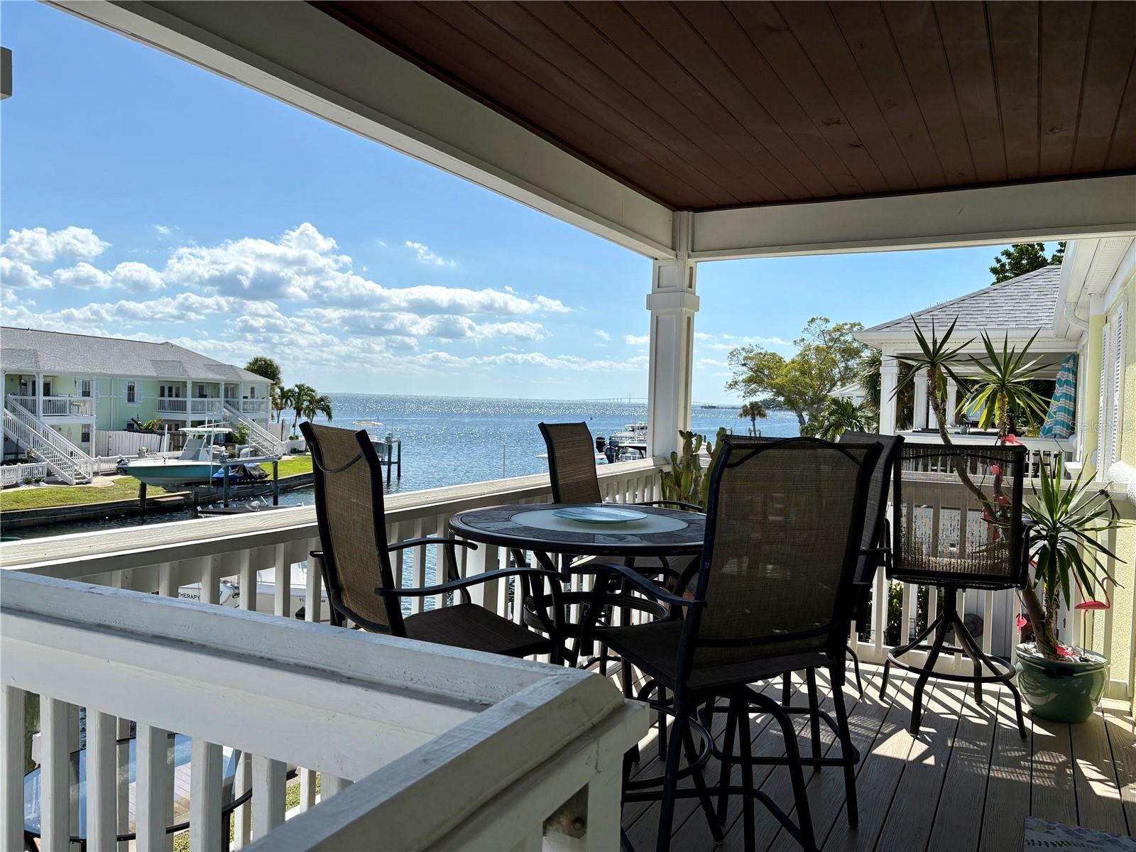 YOUR WATERFRONT FLORIDA RETREAT AWAITS! Experience waterfront living in this furnished 2-bedroom, 1-bath condo overlooking Tampa Bay and the iconic Sunshine Skyway Bridge—especially magical when illuminated at night.

Available July 1 through December 31, this condo offers flexible rental options with a three-month minimum lease (July through December preferred). Whether you're planning an extended getaway, working remotely, in need of temporary housing, or relocating to the St. Petersburg area, you'll feel right at home.

Enjoy morning coffee on the covered patio, afternoons by the pool or exploring Tampa Bay by kayak, then unwind each evening watching boats cruise by as the Sunshine Skyway Bridge sparkles in the distance.

Recent upgrades include beautiful new luxury vinyl plank flooring throughout. New photos coming soon!

Inside, you'll find a bright, comfortable living space that sleeps up to six guests. The primary bedroom features a king bed, while the guest bedroom offers two twin beds that can be converted to a king upon request. The living room includes a queen sleeper sofa with a new queen mattress, providing flexible accommodations for visiting family and friends. The fully equipped kitchen has everything you'll need to prepare meals at home, and a tabletop Weber grill is provided for casual cookouts on the covered patio. High-speed internet, expanded cable, electric, water, sewer, and trash service are all included, so simply unpack and start enjoying the Florida lifestyle. Just bring your suitcase—everything else is waiting for you.

Nestled within the gated waterfront community of Waterside at Coquina Key South, you'll enjoy an incredible collection of resort-style amenities, including a 24-hour staffed security gate, two swimming pools (including a waterfront pool overlooking Tampa Bay with a hot tub), a fitness center, and a waterfront clubhouse featuring a community pub, pool table, library, and an active calendar of social events. Outdoor enthusiasts will appreciate the kayak launches, fishing pier, tennis, pickleball, basketball, volleyball, and shuffleboard courts. Bringing your boat? Boat slips with or without lifts, as well as trailer parking, may be available for rent—ask for current availability.

Ideally located just 10 minutes from vibrant downtown St. Petersburg with its award-winning restaurants, museums, waterfront parks, nightlife, and year-round events, 20 minutes from St. Pete Beach, and 25 minutes from Tampa International Airport. Beach chairs, an umbrella, and beach towels are provided, so you're always ready for a day at the beach.

Whether you're staying for the summer, enjoying Florida's beautiful fall weather, or making St. Petersburg your home for a few months, this waterfront retreat offers the perfect blend of comfort, convenience, and resort-style living. Come experience why so many people fall in love with life on Tampa Bay.

Sorry, no pets. Tenant fees include a $50 background check, a $100 HOA lease application fee, a $1,300 refundable security deposit (may be adjusted depending on lease length), and a $150 departure cleaning fee.