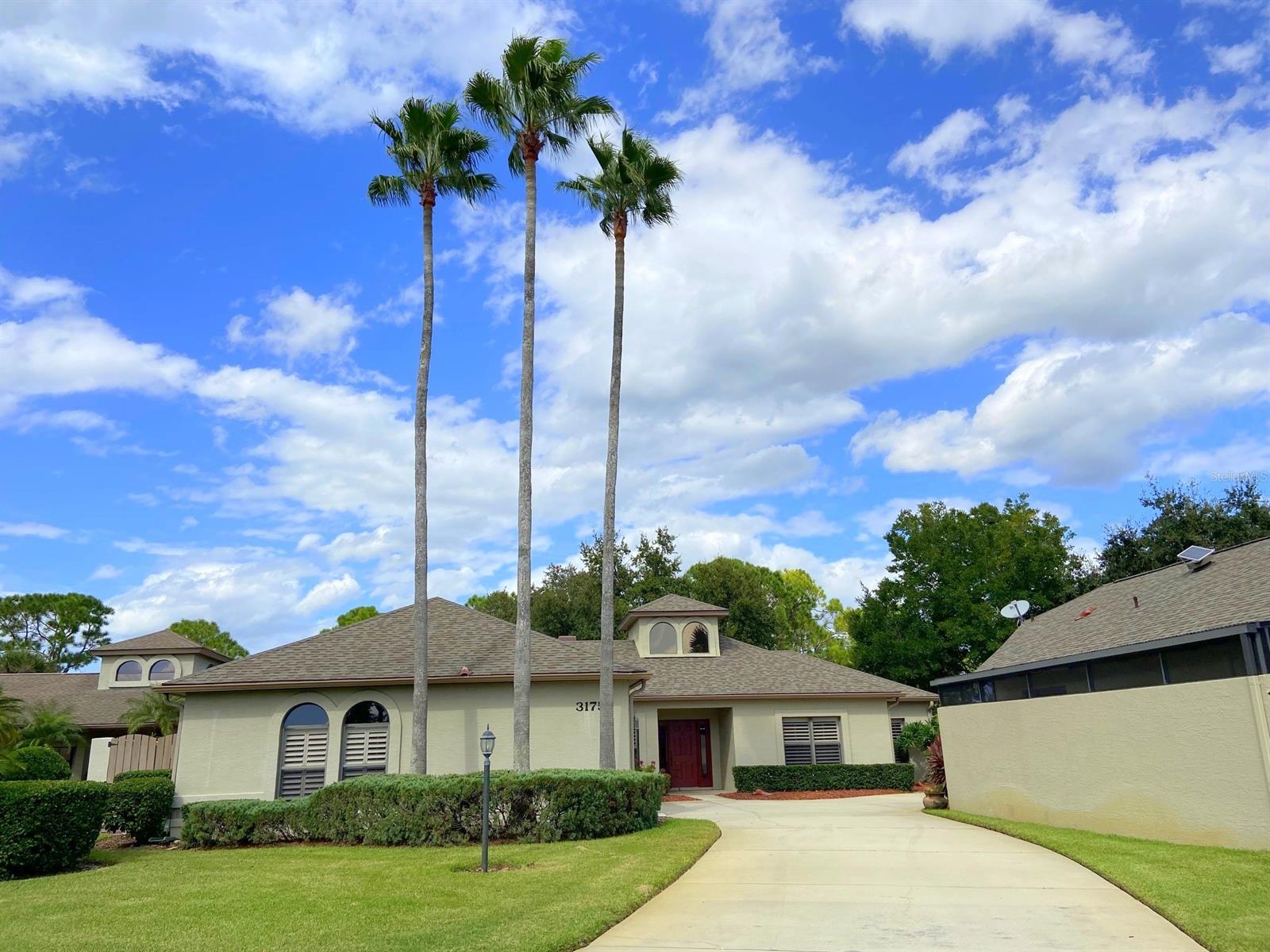 Impeccably Maintained 2 Bedroom + Den, 2 Bath residence in Wedgewood at Spruce Creek Fly In overlooks the 16th Green in a neighborhood which provides a condo-like carefree lifestyle. Freshly painted & Move-In Ready, this home offers: Newer Roof & Gutters, new Plantation Shutters, Fireplace & Water Heater. Updated Stainless Kitchen. Owners' Suite has generous walk-in closet & Bath with dual vanity sinks, soaking tub, separate shower & conveniently located Washer & Dryer. Enjoy the Covered Screened Lanai with comfy outdoor seating around a charming fire table & a view of your Trex Bench Tree Swing & golf course. This Johnson Group-built home is All One Level with no step-downs.  Wedgewood HOA covers Lawn & Common Area maintenance,  Exterior Painting & Community Pool.  The luxury & quality found in Spruce Creek Fly-In is unmatched as an ideal family community. The private airport (7FL6) has a paved 4,000 ft runway, paved taxiways, a helipad, GPS approach, aviation fuel pumps, guest tie-down spaces & aircraft services. Spruce Creek also offers an Optional Membership Country Club with tennis, pickleball, golf, fitness facilities, a private restaurant & pool. The community has parks, an on-site restaurant, hair & nail salon, skin care, acupuncture & massage boutiques, law office, aircraft sales & avionic repairs & other professional businesses. It is close to retail stores, schools, commercial airports, recreation areas & Embry-Riddle Aeronautical University. Residents include pilots, golfers, tennis players, car and motorcycle enthusiasts, gardeners and quilters, to name just a few. There are activities devoted to children and grandchildren of residents, social clubs & community wide events. It is a 15 minute drive to the "World Famous" Atlantic Ocean beaches and about 70 miles to the Orlando "attractions" area. (Spruce Creek Property Owners Assn annual assessment for 2022 of $1600 includes 24/7 security, maintenance of private streets, airport & common areas.) ;Water: City