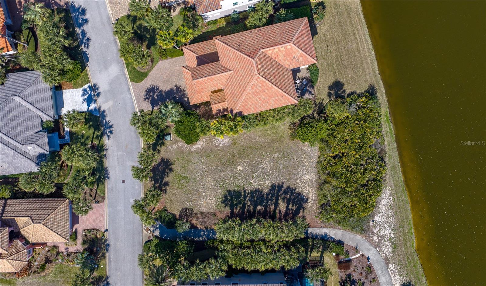 Build your dream coastal retreat on this exceptional 83 x 130 homesite located in the highly desirable Ocean Hammock community of Palm Coast. This prime vacant lot offers a generous 45 x 112 buildable envelope, providing ample space to design a custom residence while maintaining privacy and curb appeal within this beautiful coastal neighborhood. Surrounded by luxury homes, tranquil lakes, and lush tropical landscaping, the property is just moments from the Atlantic Ocean with convenient access to a nearby beach walkover. Ocean Hammock is known for its peaceful setting and proximity to premier amenities including Hammock Beach Resort, championship golf courses, fine dining, and marina access. Ideally located between St. Augustine and Daytona Beach, this homesite offers the perfect opportunity to build in one of Palm Coast’s most desirable coastal communities.