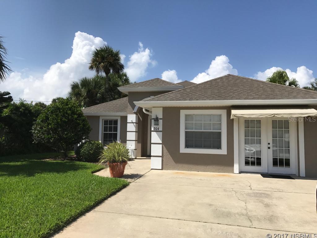 Bring your surfboard - and live the dream. this home is located on Beachside NSB - North of Flagler and just a short walk to the beachspacious 4 bedroom 3 bath home with lawn care and pest control included. Available now