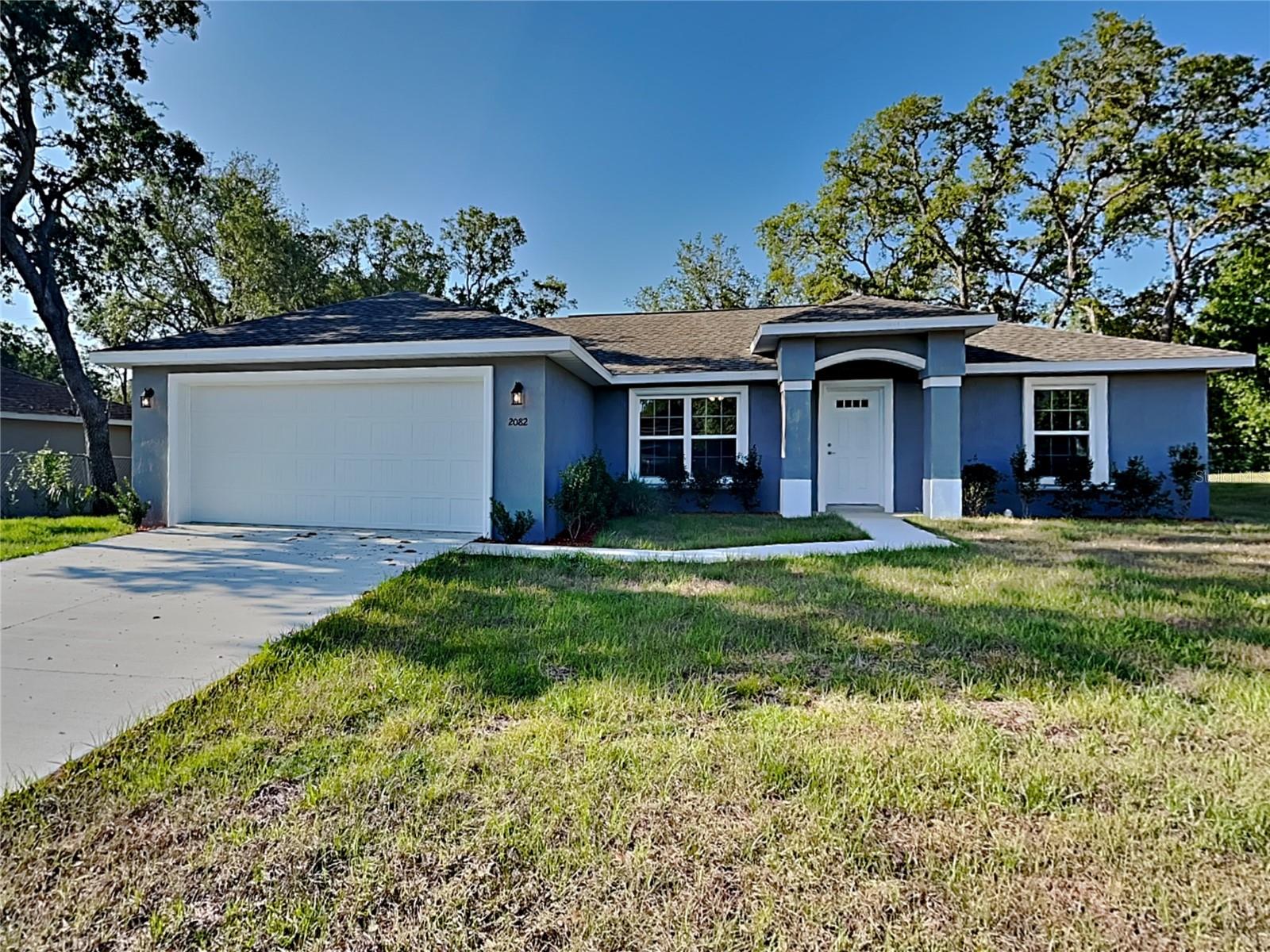 Discover your dream home in beautiful Citrus Springs! This stunning brand-new residence features 3 bedrooms and 2 bathrooms, offering the perfect blend of comfort and style. The open-concept family and dining room boasts modern vinyl flooring, making cleanup a breeze.
The gorgeous kitchen is a chefs delight, equipped with sleek stainless steel appliances, elegant granite countertops, and a convenient pantry for all your culinary needs. Retreat to the spacious master bedroom, complete with a luxurious walk-in closet and en-suite bathroom featuring a stand-up shower and dual sinks for added convenience.
Additional highlights include a dedicated laundry room with hookups, a two-car garage with stylish epoxy flooring, and a relaxing covered lanai where you can unwind and enjoy the outdoor scenery. Experience the perfect combination of modern living and serene surroundings in this exceptional home!

OK - WITH NON SHEDDING DOGS

Resident Benefit Package: $49.00-month. Includes HVAC air filter delivery, Tenant Liability Insurance, Credit Reporting, Tenant Rewards Program, and much more! 
This property is eligible for deposit alternative coverage in lieu of a security deposit. For information and enrollment, please contact our leasing team and enjoy a deposit-free renting experience.