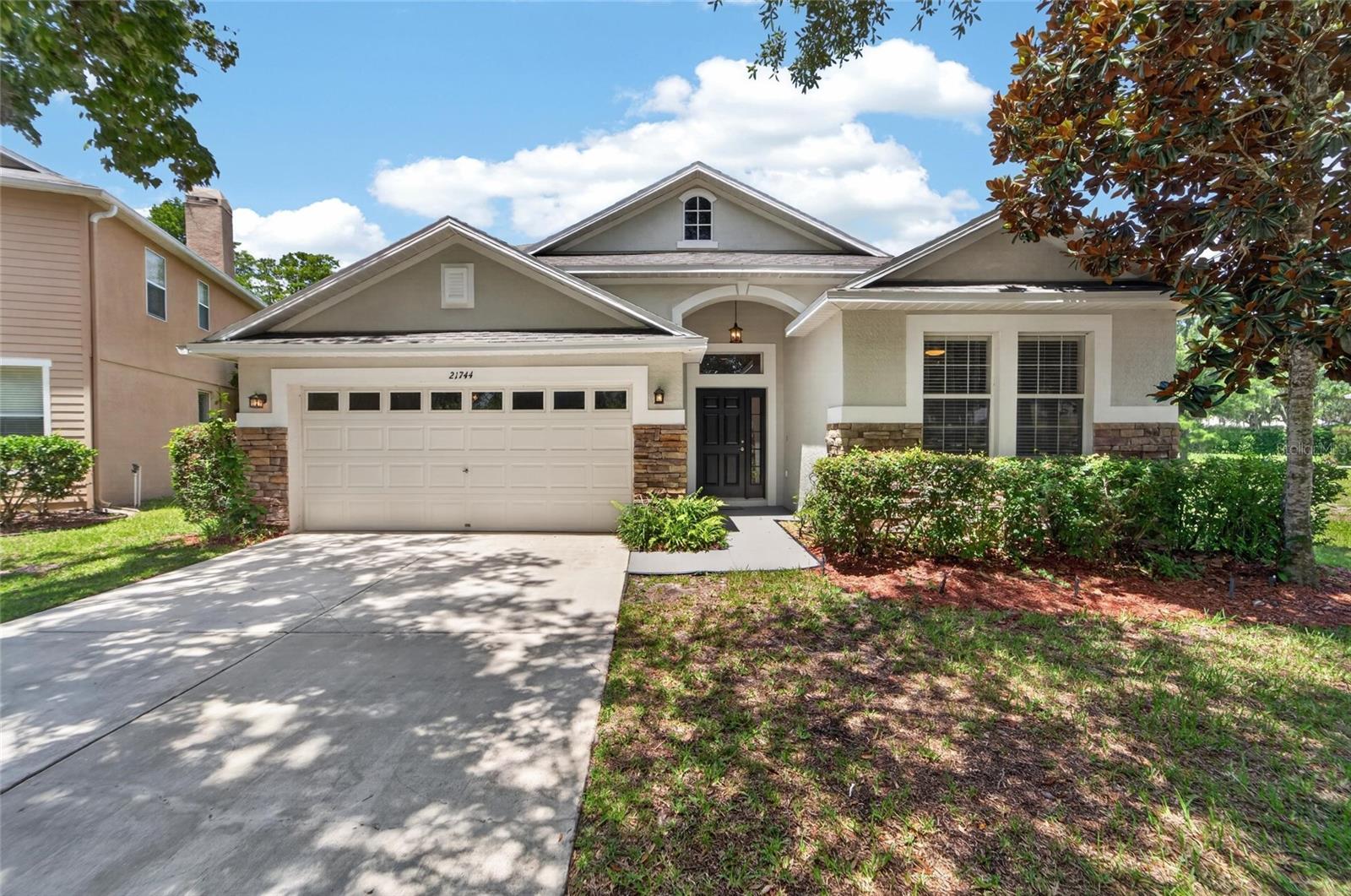 Virtually Staged. Renovated, Extensively updated and Tastefully upgraded with modern finishes. Move-in Ready. 4-Bedroom, 3-Bath POOL Home with BONUS ROOM is located in the highly desirable Wilderness Lake Preserve community. Situated on an oversized conservation lot with no rear neighbors for optimal privacy. A completely updated kitchen featuring a plethora of new shaker-style cabinetry, quartz countertops, and luxury vinyl plank flooring. All three bathrooms have been renovated with shaker cabinets, quartz countertops, updated mirrors, and new hardware and more. Additional improvements include new interior paint throughout, new stair treads and landings, new luxury vinyl plank flooring, and new carpet and padding in the owner's suite and secondary downstairs bedrooms. New roof 2020, rescreen pool enclosure 2022 and newer stove and dishwasher and exterior paint. The flexible floor plan features a split-bedroom layout with the owner's suite and two secondary bedrooms on the main level. Upstairs, you'll find a private fourth bedroom, full bathroom, and bonus room, making an ideal guest suite, home office, media room, or multi-generational living space. Outdoor backyard oasis includes screened enclosure encompassing generous sized sparkling pool with waterfall and extended lanai area not to mention picture perfect.. peaceful.. conservation views. 
Residents of Wilderness Lake Preserve enjoy access to resort-style amenities including multiple pools, fitness center, spa, nature center, theater, playgrounds, tennis courts, basketball courts, and community dock.
Combining all the extensive updates, a versatile functional floor plan, and a premium home site  this home is ready for its next owner.