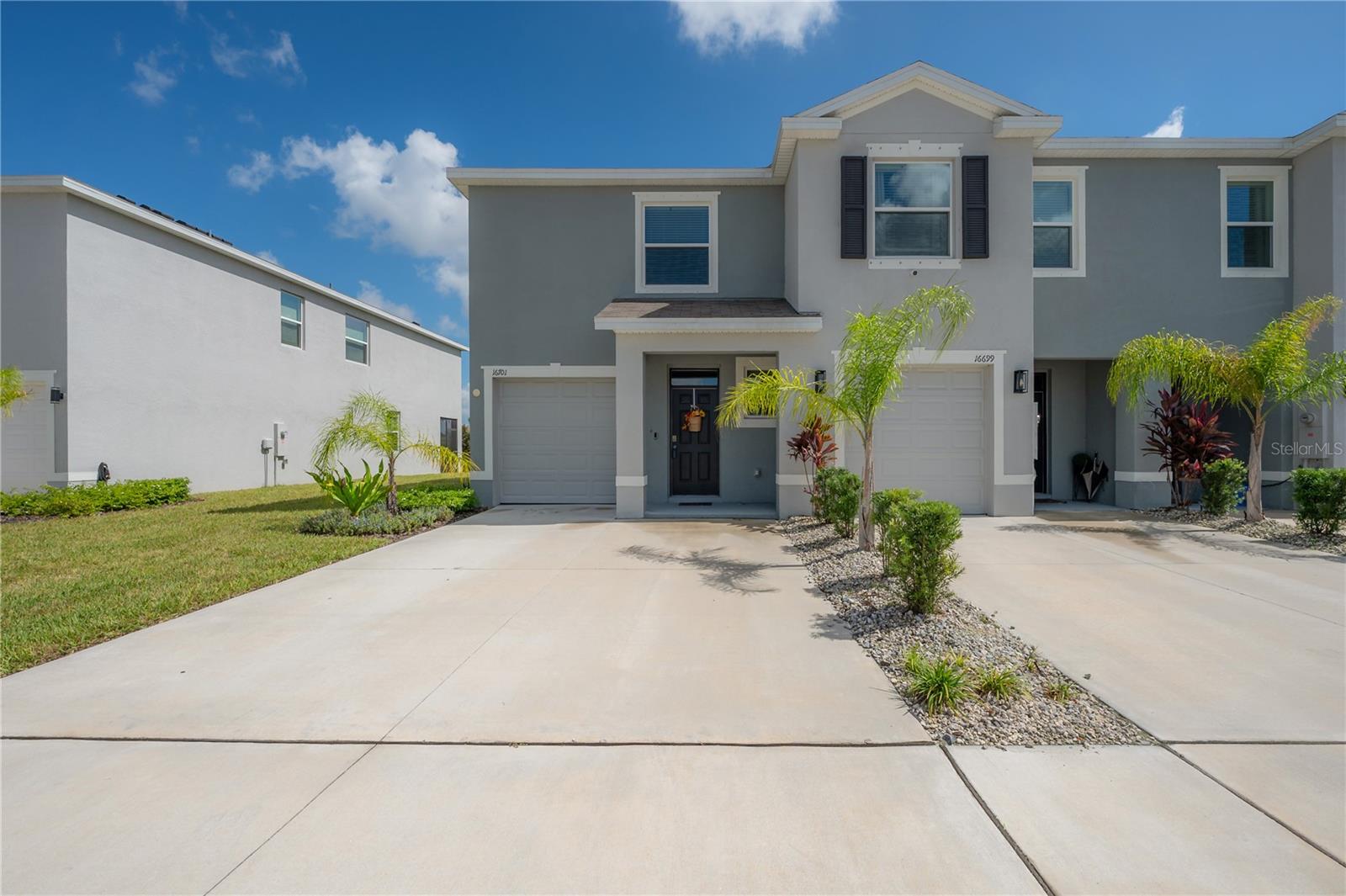Experience the best of modern Florida living in this 2023-built townhome in the sought-after Southshore Bay Lagoon community in Wimauma! This stylish 3-bedroom, 2.5-bath home blends comfort and sophistication with an open-concept layout, spacious living areas, and serene pond views from sunlit windows that fill the space with natural light. The sleek kitchen features stainless steel appliances, quartz countertops, and a large island perfect for casual dining or entertaining. Upstairs, the primary suite offers a relaxing retreat with a walk-in closet and a beautifully appointed bathroom. But what truly sets this home apart is its access to the Southshore Bay Lagoon—a stunning 5-acre crystal-clear oasis where residents can enjoy swimming, kayaking, paddleboarding, and lounging on white sandy beaches just steps from home. The community also offers walking trails, playgrounds, and resort-style amenities designed for everyday enjoyment. Located in the growing city of Wimauma, you’ll enjoy peaceful suburban living with easy access to Tampa, Riverview, and the Gulf Coast’s best beaches. Whether you’re relaxing by the lagoon, hosting friends in your stylish new home, or exploring everything Wimauma has to offer, this townhome invites you to live the ultimate Florida lifestyle. Call today!