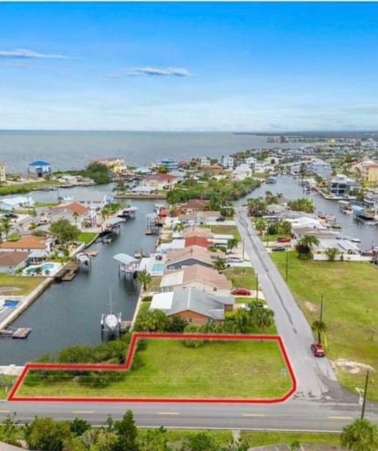 Build your vision on Lot 20 Malcom Ave in Hudson! This vacant parcel offers a great opportunity for a custom home, seasonal retreat, or investment property in a growing coastal community. Conveniently located near local shopping, dining, medical facilities, and just minutes from the Gulf, you’ll enjoy both everyday convenience and Florida’s laid-back lifestyle.