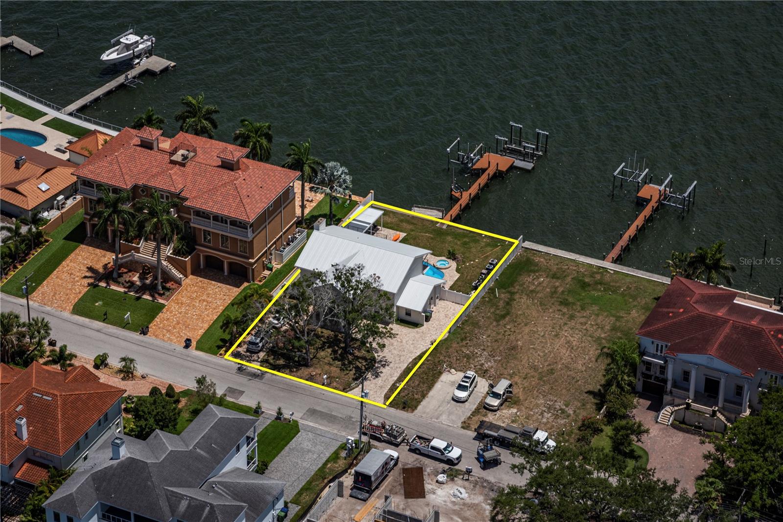 Exceptional opportunity to build a custom waterfront estate on one of South Tampa's most desirable open bayfront homesites. Offered for land value only, this 80' x 130' property boasts approximately 130 feet of direct frontage on Old Tampa Bay with breathtaking, unobstructed open-water views. The existing structure is not warranted, and the true value lies in the extraordinary homesite and location. Surrounded by luxury waterfront residences, this property presents a rare chance for builders, developers, or end users to create a showcase estate with panoramic views and direct access to Tampa Bay for smaller sports watercraft or large sportsman fishing boats. Ideally situated in South Tampa, residents enjoy convenient access to Tampa International Airport, Downtown Tampa, International Plaza, major business districts, I-275, I-4, and the bay bridges leading to the Gulf beaches. Orlando and Disney attractions are also within an easy drive. Whether you're envisioning a modern waterfront masterpiece or a timeless coastal retreat, this premier open bay lot offers an unparalleled setting for luxury living.