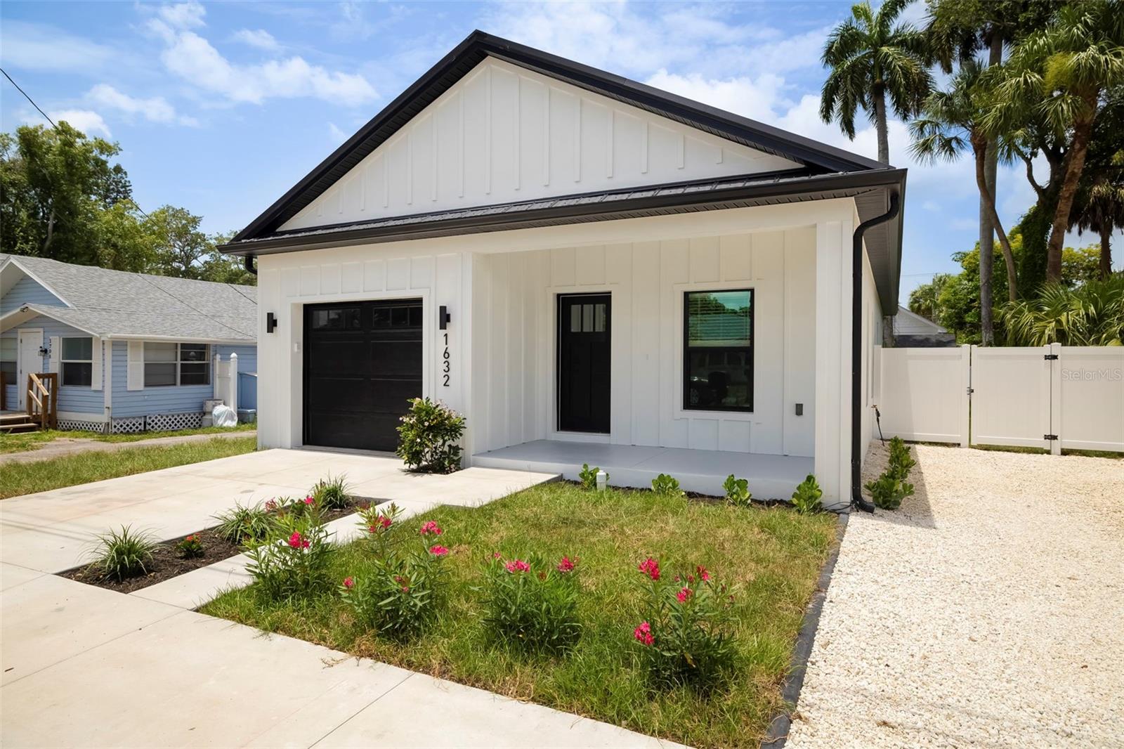 Stunning New Construction in the Heart of Bradenton! This exceptional New Construction Home truly has it all—quality craftsmanship, premium finishes, and an unbeatable location. Built with solid block construction, impact-rated windows and doors, foamed-in insulation, and a 50-year metal roof, this home was designed for durability, energy efficiency, and low maintenance. Inside, you'll find wide-plank flooring throughout, solid wood interior doors, soft-close wood cabinetry, designer feature walls, high-end tile selections, and thoughtful upgrades at every turn. Best of all, there are no HOA or CDD fees (insurance under $1,000/year). Situated high and dry on a stem wall foundation, the home is directly across from the natural beauty of Wares Creek while being just minutes from Downtown Bradenton, the Riverwalk, Anna Maria Island, and the area's world-renowned Gulf beaches. A charming covered front porch welcomes you inside, where soaring ceilings and custom wall details create an impressive first impression. The open-concept floor plan is centered around a stunning Kitchen featuring an oversized 8 foot waterfall island, Quartz throughout with premium finishes, and abundant storage, perfect for entertaining or everyday living. Every detail has been carefully selected to create a timeless, sophisticated design that feels both luxurious and inviting. Offering three spacious bedrooms and two spa-like bathrooms, the layout provides the perfect balance of comfort and functionality. Step outside to the covered rear lanai overlooking a generously sized backyard with plenty of room to add a pool, spa, or outdoor entertainment area to add on to your own private Oasis. Located in one of Bradenton's fastest-growing neighborhoods, this home offers not only an incredible lifestyle but also outstanding long-term investment potential. With its premium construction, designer finishes, and prime location, this is a rare opportunity to own a truly remarkable and extraordinary home in one of the city's most desirable emerging areas.
