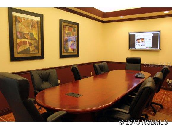 There is now an office suites building in New Smyrna Beach Industrial Park! The suites are priced from $450.00 to $600.00 per month. Rent includes all utilities,(including wi-fi internet), tech support, fully equipped conference room featuring video conferencing, surround sound and large dry erase board, kitchenette and reception area.There are three addresses associated with this building, 1360, 1364, and 1368 Turnbull Bay Road. The building has 12 separate offices. This remarkable building was built to exacting standards by the previous owner. Designed to be a showplace, this property has four separate units each with its own front entry and a rear entry with an overhead door. The property is conveniently located off US #1 and it is easily accessible from I-95. It is within a short distance to the NSB Municipal Airport. There is a large parking area in front. Everything about this building is impressive, from the beautiful reception areas to the large offices and the executive board room. For those who want to make a statement that they value their customers and want to work with them in a professional space, this is the perfect place. ;Water: City