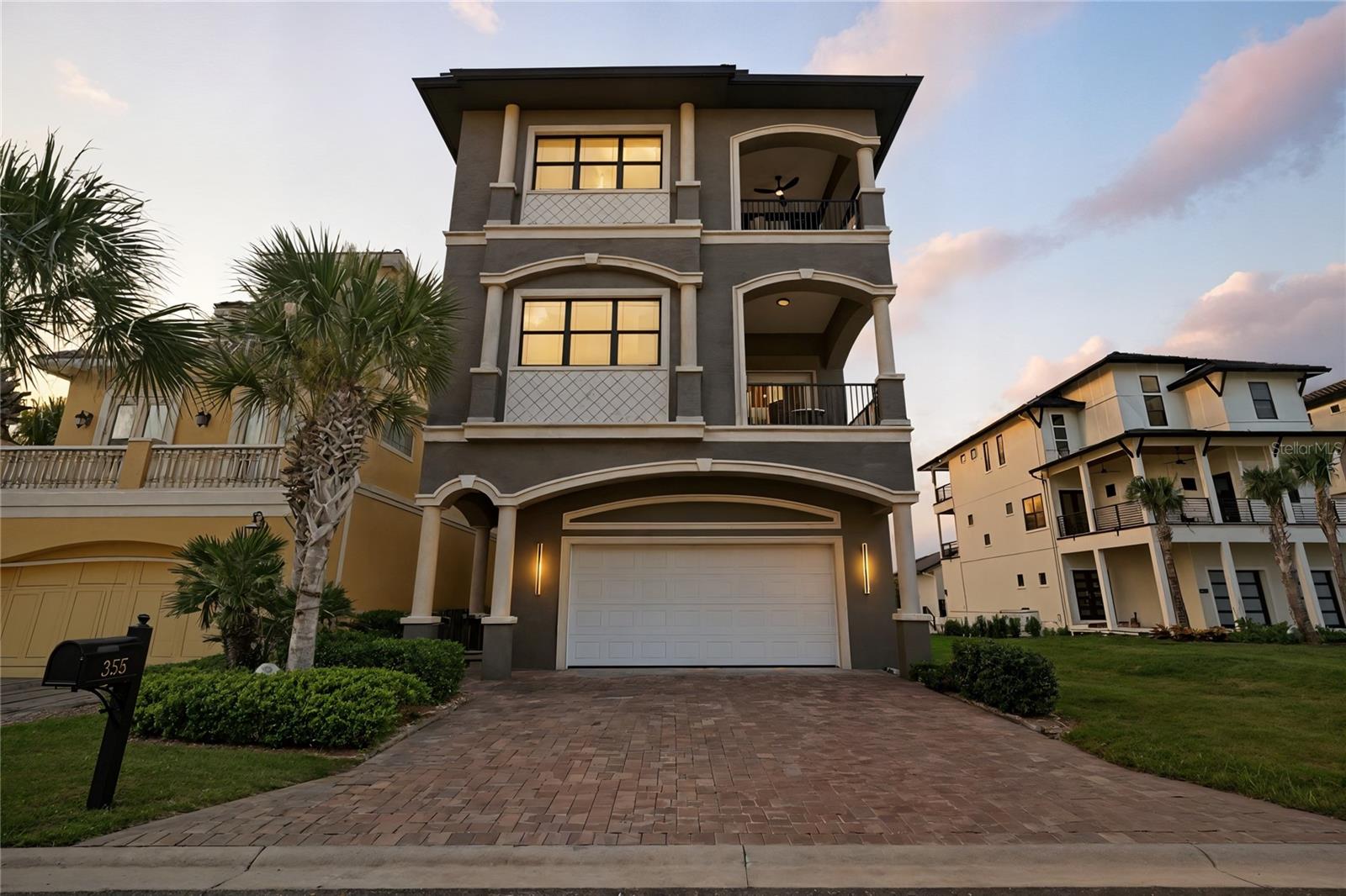Walking distance to the Hammock Beach!!! 

Experience resort-style living at 355 Ocean Crest Drive, an elegant 3-story residence in the exclusive Hammock Beach community. Offering nearly 4,000 sq ft of refined living space, this home blends timeless design with modern comforts and breathtaking views.
Inside, you’ll find 3 bedrooms, 3.5 baths, an elevator, and open living areas designed for both entertaining and relaxation. The top-floor master suite includes a private sitting area, a wet bar, a bonus room to be used as a home office or as you wish, spacious walk-in closets, and serene ocean and golf course views. 
Step outdoors to your private paradise: a heated saltwater pool with spa, summer kitchen, and multiple covered patios perfect for al fresco dining and sunset gatherings. Overlooking the Jack Nicklaus–designed golf course and with lake frontage, the home offers a rare combination of golf, water, and coastal living. Best of all, it’s just a short walk to the beach, oceanfront dining, and local restaurants, which makes every day feel like vacation.
Additional highlights include a 2-car garage, hurricane shutters, block/stucco construction, and HOA-maintained grounds. Residents enjoy direct access to the beach, and if desired, may enroll in Hammock Beach Club membership options: Full 2 Golf courses option (including the well-known Ocean Course, also known as Jack Nicklaus Ocean Course) + Beach Club or Beach Club Social only. Membership is required for use of the resort amenities and golf course. Details available upon request.

This is more than a home — it’s a coastal retreat designed for those who seek the ultimate Florida lifestyle.