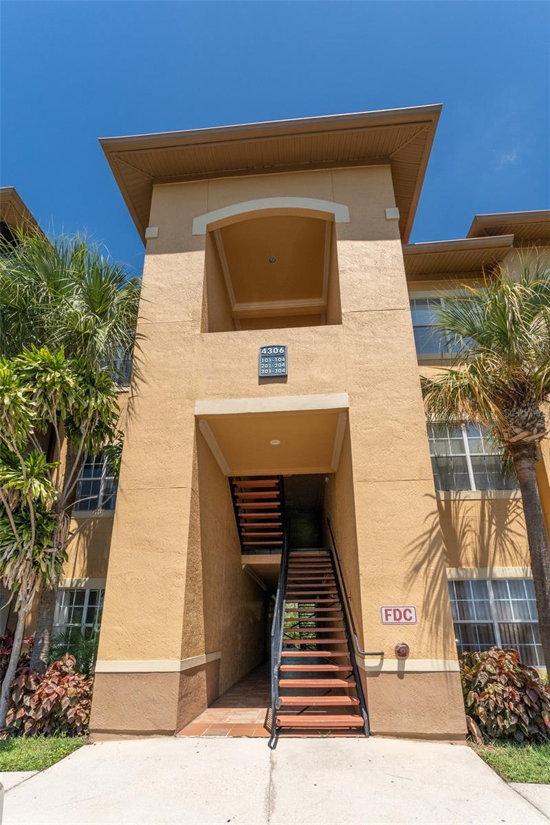One or more photo(s) has been virtually staged. Welcome home! If you have been looking for the perfect condo in the Tampa Bay area this is it! This 2 bedroom, 2 bath unit is located in the Beachwalk Condo Community. Beachwalk is a gated waterfront community that offers a resort style pool, club house with media room, internet business & fitness centers. The unit has had many updates including: AC (8/20), hot water heater (5/21), interior paint, new laminate flooring in bedrooms, granite countertops throughout, rewrapped cabinets, knobs, handles & faucets (8-12/2021). The primary bedroom has a walk-in closet & ensuite. The 2 bedroom also has a walk-in closet & the secondary bathroom can be accessed both by that bedroom & the living room. All appliances in the kitchen have been replaced, except the refrigerator, in 2021. The washer & dryer convey & they to were replaced in 2021. There is crown molding in the living spaces with lots of natural light. A coat closet for extra storage. French doors lead to the fulled screened & covered balcony where you will enjoy relaxing views. Building 4306 is in the back of the complex surrounded by conservation so you have no other building in your view. This 2nd floor home comes with your own assigned parking spot #272. Your mailbox is located left of the gate house, #45 & there are storage units for rent. Enjoy the maintenance free living that  this water view community has to offer. Conveniently located less than 10 minutes to the Tampa International Airport, I-275, the Veterans Expressway, shopping malls, plenty of restaurants & entertainment. Make your appointment today to see this amazing home!