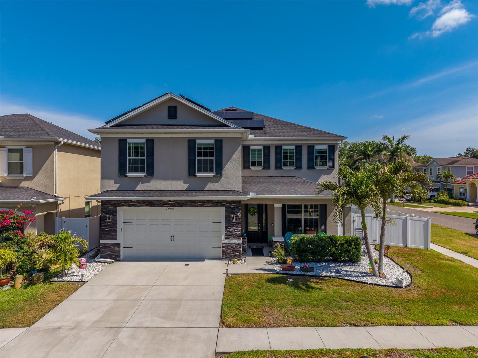 Welcome to this spacious and beautifully designed 4-bedroom, 2.5-bath, 2-car garage pool home situated on a large corner lot in desirable Pinellas Park. With over 3,100 square feet of living space, this two-story residence offers an expansive open floor plan ideal for comfortable living and entertaining.
The heart of the home is the impressive kitchen, featuring a center island, abundant cabinetry, double built-in ovens, stainless steel appliances, and a wine chiller—perfect for hosting gatherings or preparing family meals. Soaring ceilings and plentiful natural light create a bright and airy atmosphere throughout.
Enjoy flexible dining options with both a formal dining room for special occasions and a casual dinette area off the kitchen for everyday meals. A generously sized indoor laundry room includes cabinets and a utility sink for added convenience.
Step outside through elegant French doors to your private outdoor oasis—complete with a large covered patio, attached pergola, and a sparkling pool overlooking the spacious yard.
Upstairs, you’ll find all four bedrooms along with a massive bonus room that can serve as a second living area, home office, or gym. The split-bedroom layout provides privacy, connected by a hallway featuring a charming built-in bookshelf.
Additional highlights include energy-efficient solar panels to help reduce utility costs, and the home is located in an X flood zone for added peace of mind. Just a short 10-minute drive to the beautiful Gulf beaches, and conveniently close to shopping, dining, and I-275.
Tucked away in a quiet neighborhood, this home truly has it all. Schedule your private showing today—this one won’t last!