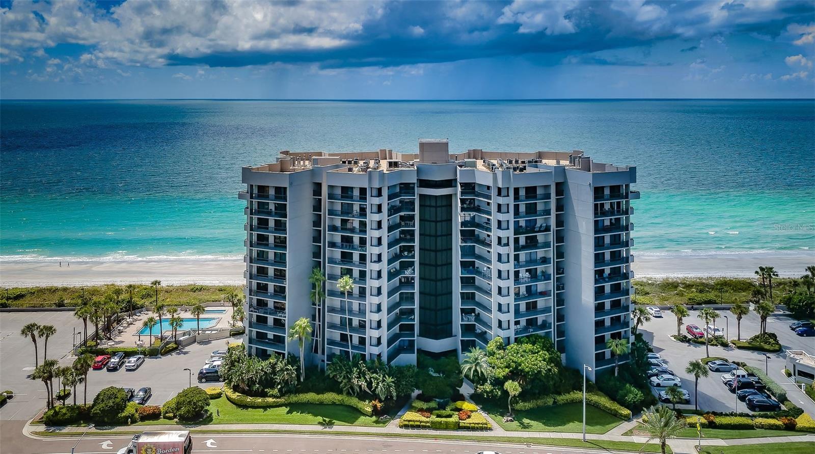 Sensational Direct Gulf front 2 BR, 2 BA residence with a one-of-a-kind 60-foot plus extended balcony that only a second-floor unit has that captures Panoramic, uninterrupted & sweeping Gulf front views like no other condo on Sand Key! Every room frames a breathtaking slice of the Gulf. This prime, inside corner residence at Dan’s Island commands attention with its rare, front row position on Sand Key Beach. A TRUE “Beachfront Retreat” where the horizon feels endless, the sunsets are unforgettable, and every day carries the ease of a year-round vacation. Located on the sugary sands of Sand Key, this fully renovated Coastal, contemporary residence delivers dramatic sunsets and extraordinary views from every vantage point in the unit! Lovingly renovated from floor to ceiling, the home features impact rated hurricane windows & sliders, Contemporary Kitchen with breakfast bar, Viking stove, Sub Zero refrigerator, upgraded cabinetry, a bonus coffee bar/buffet, beautifully renovated bathrooms, custom built ins, wainscoting, crown molding, wood flooring in the living areas, tile floors in the bedrooms and baths and is being sold FULLY FURNISHED. This Contemporary 2BR/2BA, 1,610 SF residence is designed for the discerning Gulf front buyer seeking the perfect blend of indoor and outdoor living. Beyond the large foyer, the spacious Grand salon / Living area showcases front to back beach views, a tiled fireplace, and an open dining area all anchored by a full wall of glass that brings the outside in! Step through the sliders to your Supersized 60+ foot wraparound balcony that boasts unforgettable waterfront views, complete with an additional bump out extension off the Primary Suite for even more breathtaking Gulf views. The Owner’s Suite is a true “Suite Retreat,” offering private balcony access, a custom walk-in closet, and a sumptuous, fully renovated spa style bathroom with separate tub and large shower. The generous sized secondary bedroom on the opposite side of the home providing total privacy features its own, private Gulf front balcony, custom built ins, and a sizable walk-in closet. An ample sized laundry room with storage and an additional exterior storage closet completes this private enclave. Dan’s Island is known for its world class amenities, including 24-hour gated security, two heated pools & spas (one for each building), a fitness center, indoor basketball/racquetball court, and a large clubhouse with full kitchen, billiards, wet bar, and dual balconies perfect for entertaining or those special events. Seaside privacy & prestige are yours on your own private stretch of Sand Key Beach. This coveted “Two Stack” corner unit provides 180 degrees of pure beachfront with no parking lots, no rooftops, no visual interruptions - just sky, sand, and sea. Dan’s Island – Resort style living at its Finest!