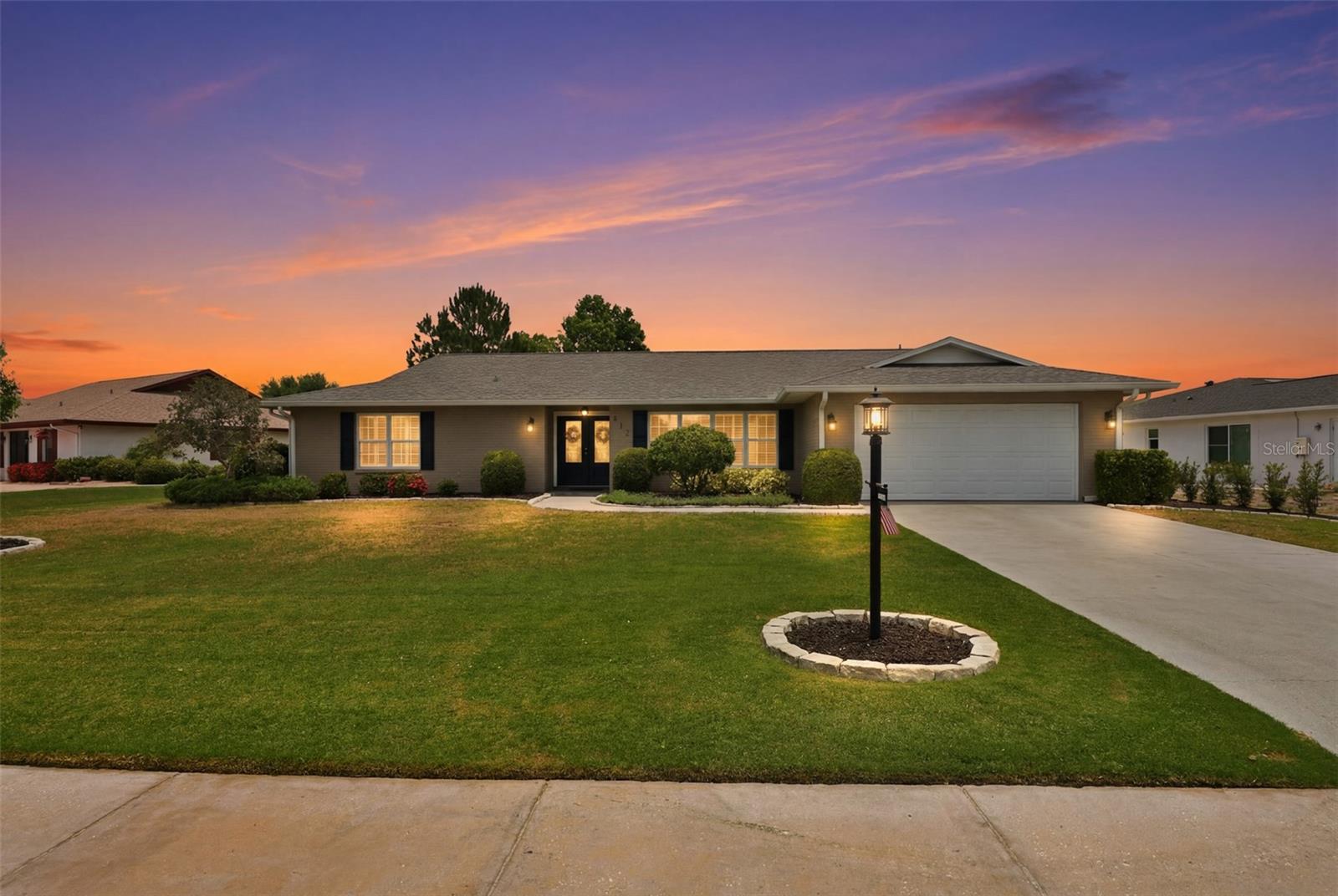 Take the virtual tour of this exceptional custom three-bedroom, plus den, home located in the desirable St. Andrews neighborhood of Sun City Center! Every detail has been thoughtfully designed and meticulously maintained. From the moment you arrive, you'll be captivated by the home's impressive curb appeal, featuring a beautifully manicured front yard and inviting double-door entry with a stunning decorative glass insert. Inside, you'll find a tastefully appointed floor plan offering both elegance and comfort. The private office/den, accessed through French doors, provides the perfect space for working from home or enjoying a quiet retreat. The spacious primary en-suite features  a large walk-in closet, dual-sink vanity, walk-in shower, and a relaxing Jacuzzi tub. Two generously sized guest bedrooms are situated on the opposite side of the home for added privacy, with one offering an oversized walk-in closet. Entertain with ease in the formal dining room, which provides ample space for family gatherings and special occasions. The open-concept great room flows seamlessly into the beautifully remodeled kitchen, highlighted by custom white cabinetry, quartz countertops, a center island, farmhouse sink, pull-out shelving, pantry storage for small appliances, and a slide-in range with a custom hood. A built-in entertainment center anchors the living area, while the adjoining sunroom with a cozy gas fireplace creates the perfect place to relax year-round. Enjoy peaceful views of the professionally landscaped backyard from the kitchen or step outside to the expansive 15' x 42' covered and screened lanai an ideal setting for entertaining family and friends. Additional custom features include crown molding, 5-inch baseboards, wood flooring throughout the main living areas and kitchen, double-pane windows, abundant interior storage, an oversized garage and an outdoor storage area perfect for recreational equipment. Pet lovers will appreciate that St. Andrews allows wrought iron fencing, and the community offers an incredibly low HOA fee of just $40 per year. This outstanding home truly has it all. Sun City Center offers an exceptional active adult lifestyle with a state-of-the-art fitness center, indoor Olympic lap pool, resistance pool, outdoor pool, and countless recreational opportunities. Residents enjoy softball, pickleball, tennis, arts and crafts, woodworking, lawn bowling, dancing, model trains, and more than 150 clubs and activities. Optional membership to Club Renaissance and golf memberships are also available. Conveniently located near shopping, dining, medical facilities, theaters, beaches, sporting events, Tampa International Airport, and the beautiful Gulf Coast attractions of Tampa, Sarasota, and St. Petersburg, this home offers the perfect blend of comfort, convenience, and carefree Florida living!