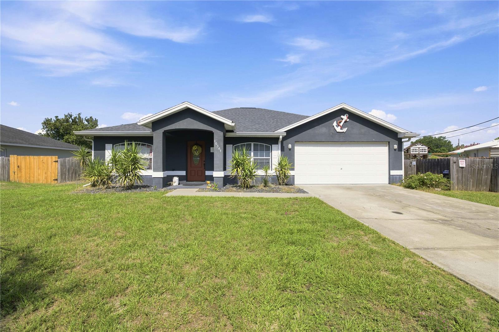Enjoy the perfect blend of space, comfort, and efficiency in this 4-bedroom, 2-bath home in Belleview. The split-bedroom floor plan offers privacy, while the versatile flex room is ideal for a home office, craft room, or playroom. The spacious kitchen opens to the main living area, creating a welcoming space for everyday living and entertaining.
Outside, you'll find a fully fenced backyard with a storage shed for added convenience and plenty of room for pets, gardening, or relaxing. Enjoy lower energy costs with the leased solar system (buyer to assume lease), and the attached two-car garage provides additional storage and parking.
Conveniently located near shopping, dining, schools, and Ocala, this home is ready for its next owner.