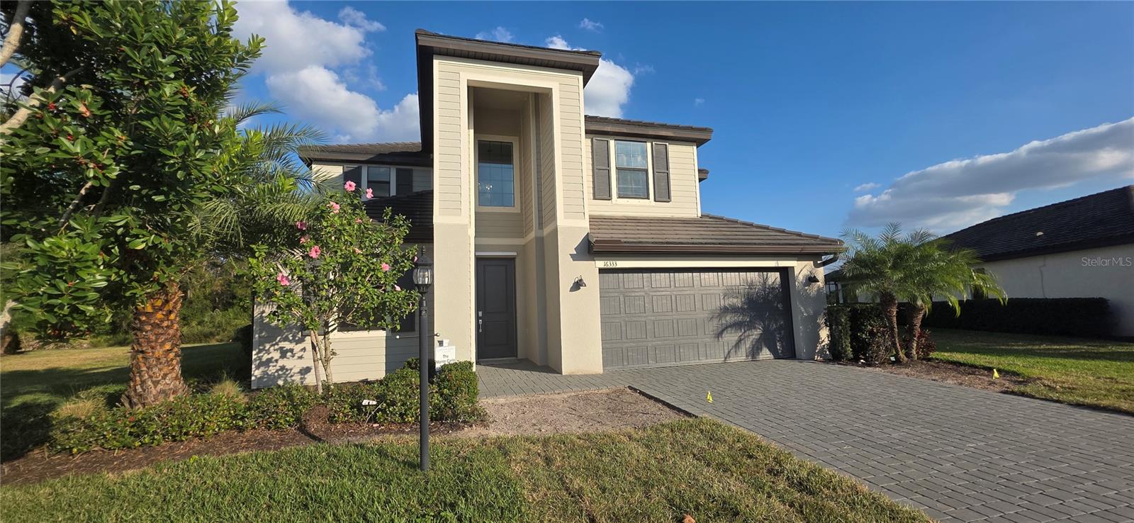 Your last chance to own a Never Lived in Builder Model Home in Lorraine Lakes.  This Monte Carlo Floor Plan is a 5 Bedroom, Bonus Room, Loft, 3 Bathroom, 3 car Garage home that is decorated, furnished and ready for you to move in.  Lorraine Lakes has it all!  Clubhouse, Bar, Restaurant, 24 Hr Fitness, tennis, basketball, arcade, volley ball and so much more!  Splash Pad and 2 Swimming pools along with a hot tub are waiting for you to enjoy.  This home has a private swimming pool and spa and a built in outdoor kitchen.
