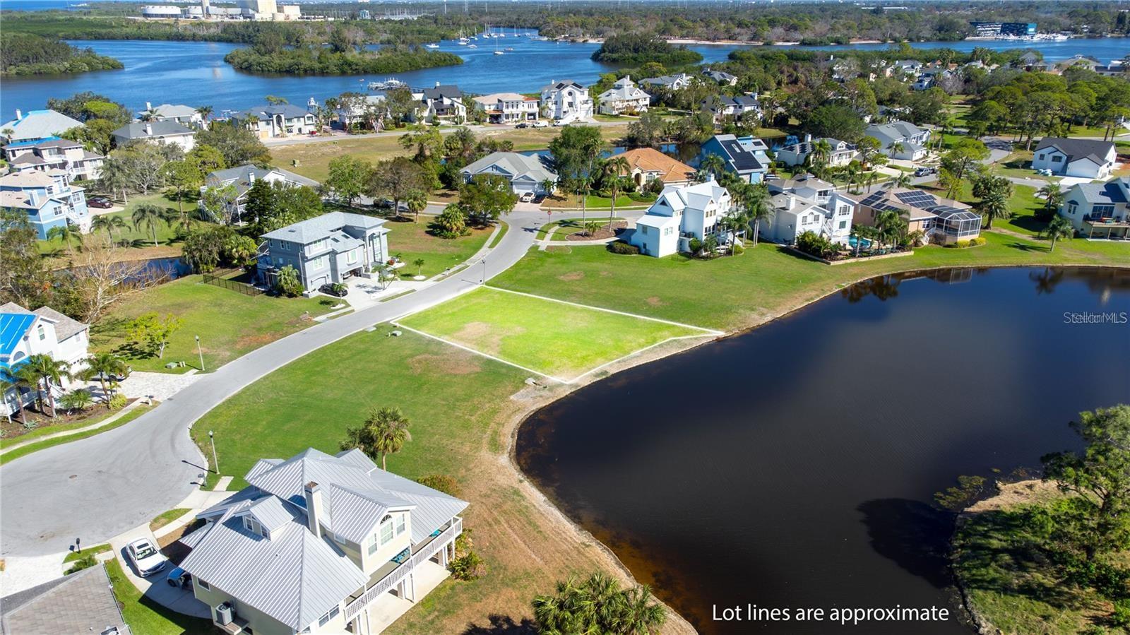Build your dream home on this stunning .21-acre lot with sweeping pond views in the exclusive, gated community of Harbour Watch. This sought-after neighborhood offers resort-style amenities including a sparkling clubhouse pool, tennis courts, and a charming gazebo with a fishing dock overlooking the Gulf. Enjoy breathtaking sunsets each evening and the convenience of being just minutes from two pristine beaches, downtown Tarpon Springs, and the vibrant shops and restaurants of downtown Dunedin. Survey and soil reports are already complete, making it easy to move forward with your plans. The property remained dry through both recent storms, though homes here are elevated to meet local building codes—ensuring peace of mind and long-term value.

Don’t miss the chance to create your ideal coastal retreat in one of the area’s most desirable waterfront communities.