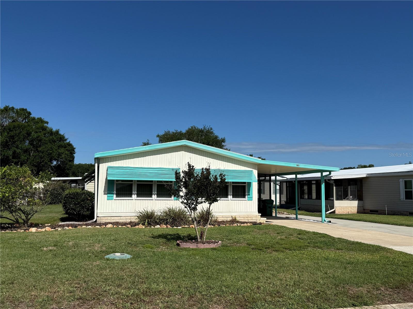 This beautifully maintained 2/2 home in Continental Country Club delivers that irresistible Florida-living vibe the moment you step inside—just 2 minutes to The Villages, 1 minute to Walmart Supercenter, and surrounded by endless local attractions, fishing, biking, and boating opportunities. Loved and cared for, this home shines with 17 new windows, new electric panel, new vapor barrier, newer membrane roof, updated flooring throughout, newer kitchen countertops, newer water heater, and a Resident Owner Certificate already purchased for you. The floorplan flows effortlessly—from the welcoming family room into the dining and living areas, then into the bright breakfast nook and spacious kitchen loaded with cabinetry and countertop space for every home chef. Both bedrooms are impressively large with walk-in closets, and the primary suite includes an additional linen closet plus a second closet for exceptional storage. Sitting in one of Wildwood’s nicest and most active golf communities, this home sits on a huge, tastefully landscaped yard, a relaxing screen room, and a utility shed complete with washer and dryer. There is absolutely nothing left to do but move in, unpack, and start enjoying the lifestyle—you’ve got to see this one and make it yours.
