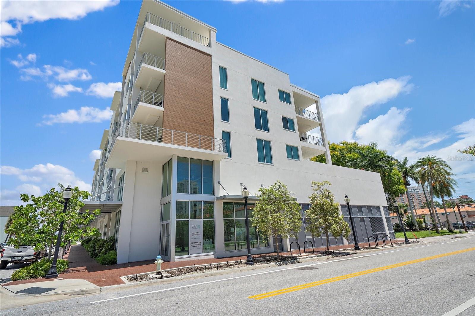 Located at 332 Cocoanut Ave in Sarasota’s Rosemary District, this well-appointed 2-bedroom, 2-bathroom condo offers a true downtown lifestyle in one of the city’s most vibrant and evolving neighborhoods. Just outside your door, you’ll find an eclectic mix of restaurants, cafés, art galleries and nightlife. The location also provides convenient access to Main Street, Bayfront Park, Sarasota’s waterfront, and a short drive to Lido Key and St. Armands Circle, making it ideal for both daily living and weekend enjoyment.

Built in 2021, the building showcases a clean, modern design with the benefit of relatively low HOA fees. Inside, the unit features a spacious primary suite with a walk-in closet, upgraded lighting, and thoughtful finishes throughout. The private patio offers a comfortable space for entertaining or relaxing, while the rooftop pool deck delivers sweeping city views and an elevated setting to unwind.

With its prime location, contemporary construction, and numerous owner upgrades, this condo presents a strong opportunity to experience comfortable, low-maintenance living in the heart of downtown Sarasota.