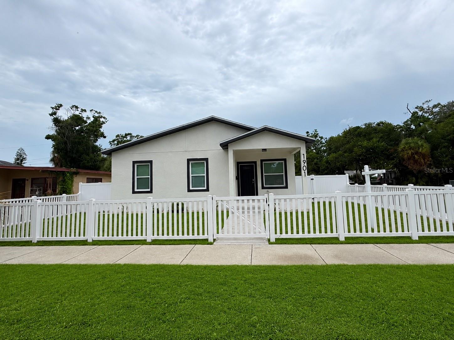 Welcome to this one-of-a-kind 2025  home in the heart of St. Petersburg! Thoughtfully designed with modern finishes and flexible living in mind, this property features a main residence with 1,440 sq ft, offering 3 bedrooms and 2 bathrooms, plus a rare detached 2-car garage. Step onto the charming front porch and into a bright, sun-filled open floor plan where the living room, dining area, and kitchen flow seamlessly perfect for entertaining or everyday comfort. The modern kitchen is a true highlight, showcasing brand-new stainless steel appliances, contemporary cabinetry, a spacious island, and ample storage and prep space. The split floor plan provides both comfort and privacy. The primary suite is tucked away on its own side of the home and includes a generous walk-in closet, an additional built-in closet, and a beautifully finished ensuite bathroom. On the opposite side, two guest bedrooms share a stylish full bathroom, along with a convenient indoor laundry room. Outside, the detached two car garage offers plenty of parking and storage options. Ideally located less than 10 minutes from vibrant Downtown St. Pete, a short drive to award-winning Gulf beaches, and close to shops, restaurants, and entertainment this exceptional property offers the perfect blend of lifestyle and location.  TO apply https://apply.link/QSdUCNg