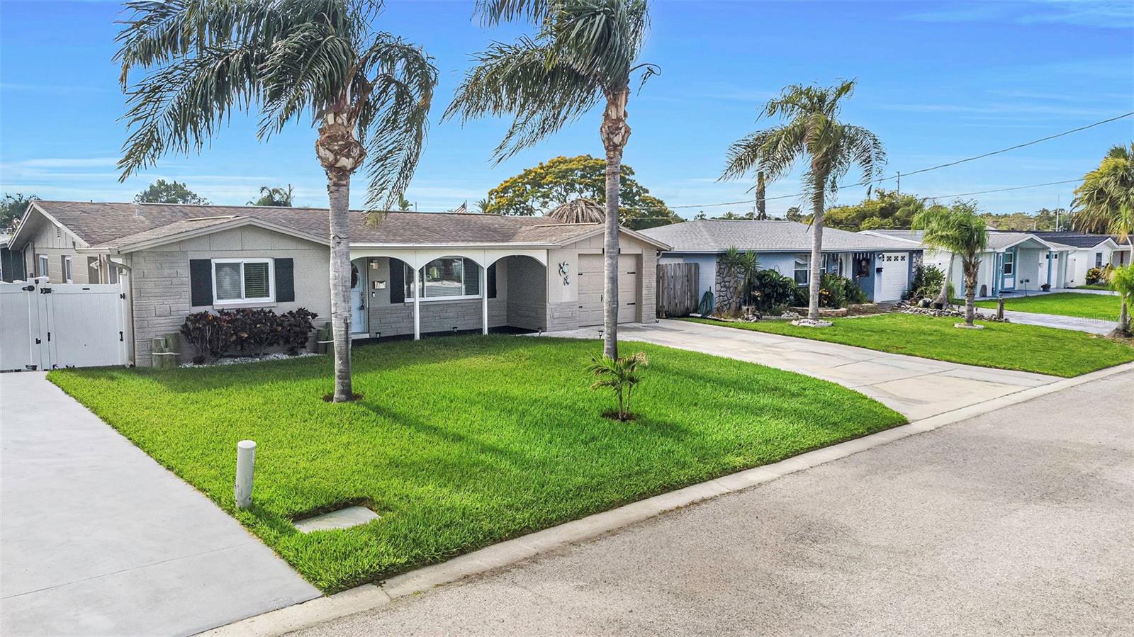 Perfect opportunity to be on the water  and watch the dolphins and manatees swim by in your back yard with Gulf access for a great price. This 2 bed 2 bath house sits on a salt water canal so bring you boat (10,000 lb. lift), jetski (separate lift for jetski), kayaks (floating dock to launch), or just throw your fishing line into the water! If you feel like relaxing for the day, you can sit on your pool deck or spend the day comfortably in your saltwater pool which provides a nice waterfall backdrop! There is plenty of room for entertaining outside or on your enclosed patio room! Enjoy all of the natural light that the inside of this house gets. The interior has an updated kitchen, inside laundry room, access from the primary bedroom to the outside covered patio. This is a true waterfront paradise, live like your on vacation every day! 40 minutes from Tampa Airport, 30 minutes from Tarpon, 40 minutes from Honeymoon, 20 from Weeki Wachee!