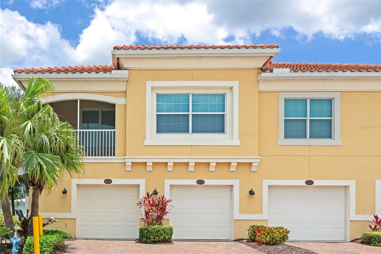 Welcome to Bay Street Village in Osprey, gorgeous gated community where maintenance-free living awaits. This  immaculate end-unit condo freshly painted with new LVP stairs and flooring features 2 bedrooms, 2 bathrooms, garage, located beneath the unit and offers a private interior stairway leading to your second-floor residence. Open-concept living and dining area are perfect for entertaining beautiful kitchen with center island, walk-in pantry and stainless steel appliances. The primary suite offers a walk-in closet and an ensuite bathroom with dual sinks, a makeup vanity, and a walk-in shower. Bay Street Village provides resort-style amenities, including a sparkling pool and a fitness center, along with plenty of guest parking. The community is dog-friendly, with a fantastic dog park just a short walk outside the gate. Outdoor enthusiasts will appreciate the easy access to the Legacy Trail right on Bay Street. Pine View School for the Gifted (grades 2-12) is conveniently located on the next street. Bay Street offers easy access to Nokomis Beach and the world-famous Siesta Key Beach. Close to shopping and restaurants.