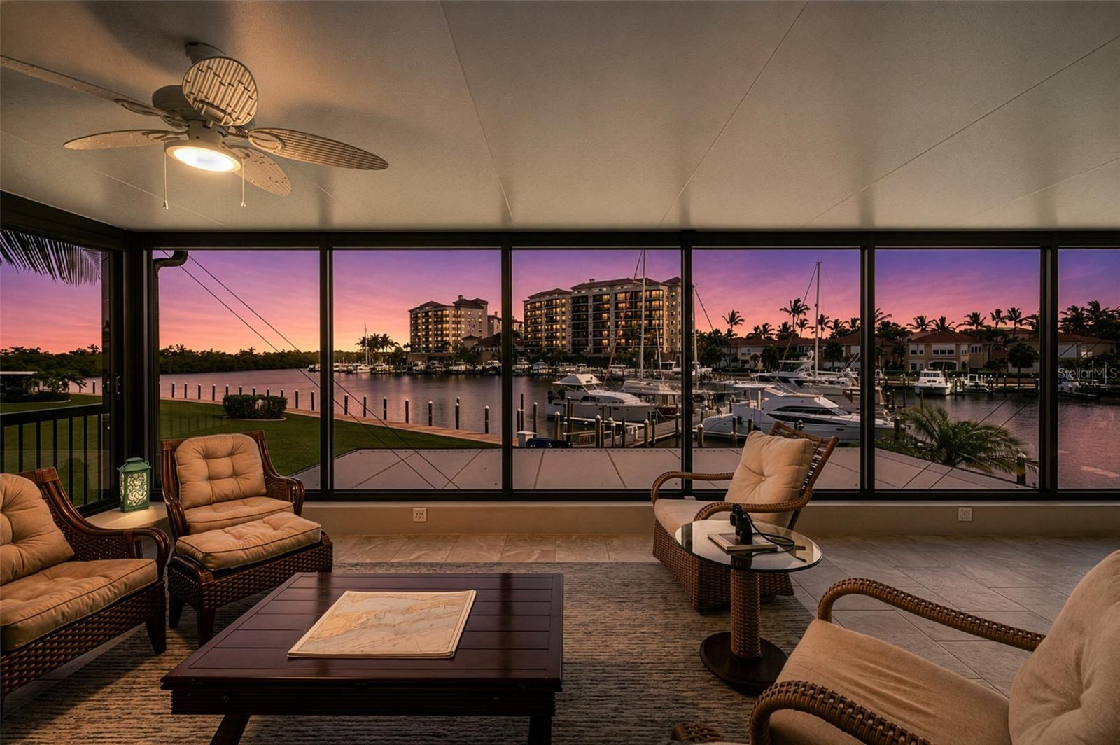 Panoramic views from this unit’s premiere location within Marina South Shore community. Second floor end unit positioned with lovely views of the sunrise & sunset. One of only 3 second floor units that enjoy the 180 degree views of the South Basin boating action.



Expansive 2 bedroom, 2 bathroom configuration with dedicated office area and storage room. Kitchen, dining and living room all enjoy the expansive views and abundant natural light.



Luxury features include: Beautiful large scale tile flooring that flows from the kitchen thru living room into the sunroom. Newly tinted windows (3M) in the sunroom and master bedroom. Custom shutters on all windows, automated shades in master bedroom and living room, for privacy and additional light control. Well loved and beautifully maintained unit.



Marina South Shore is one of Burnt Store Marina's most sought-after gated communities. Offering residents a private clubhouse, resort-style pool, elevators, beautifully maintained grounds and a completely updated exterior including new paint, roof and gutter systems. 



Burnt Store Marina is the largest deep-water marina in Southwest Florida's Gulf Coast.  Residents enjoy an unmatched lifestyle with direct boating access to Charlotte Harbor and the Gulf of Mexico. 



Boating enthusiasts will love the onsite marina offering Freedom Boat Club, Private charters, valet boat storage, fuel and provisions from the Trading Post.



Community amenities include waterfront dining, a 27-hole executive golf course, fitness center, tennis and pickleball courts, the Trading Post convenience store, yacht club activities, and endless opportunities for boating, fishing, and social events.
