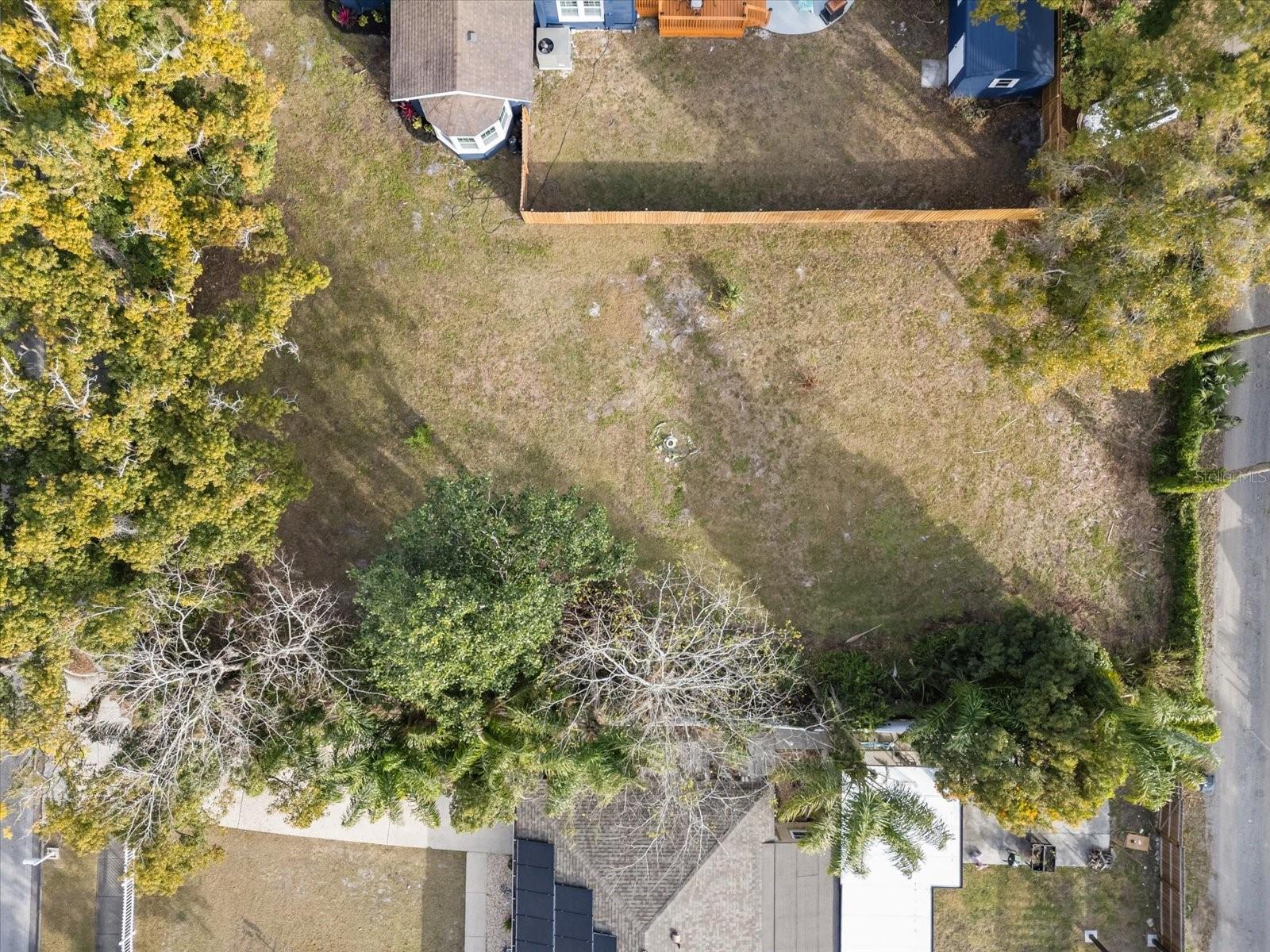 This is an extraordinary opportunity to own a vacant lot measuring 70 X 155 right next door to a beautifully restored 1924 home in the heart of Sanford’s historic district. Homesites like this are a true rarity—a needle in a haystack—within the City of Sanford. With the lot ready for your dream home, complete with a survey attached in the MLS, this is a chance to create something truly special in a prime location. Sanford is a city on the rise, blending historic charm with modern conveniences and unparalleled growth. Just minutes from vibrant Downtown Sanford, you’ll enjoy access to a thriving scene of locally-owned restaurants, boutiques, breweries, and community events. The area is brimming with character and offers a lifestyle reminiscent of Winter Park, yet with its own unique flair. Exciting developments are on the horizon, including a new Costco and continued revitalization, making Sanford one of the most sought-after areas in Central Florida. Opportunities like this do not come along often. If you let this pass you by, you may never find another buildable homesite in such a desirable location. Whether you're looking to build your dream home or invest in a growing area, this lot is your chance to secure a piece of Sanford’s historic charm and bright future. Don’t miss out—schedule your visit today and imagine the possibilities!