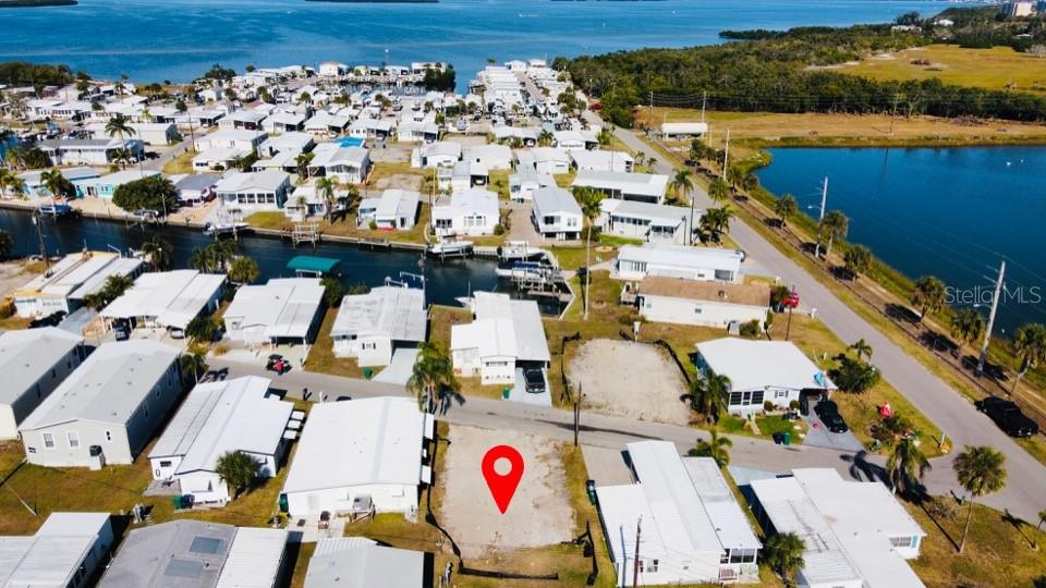 Bring your vision to life in Tropic Isles  a resident-owned 55+ waterfront community; one of the West Coast’s best-kept secrets!
This 45’ x 70’ vacant lot offers the perfect opportunity to design your Florida retreat just the way you want it. Facing North for ideal light and
breezes. Tropic Isles features resort-style amenities including a full-service marina and boat ramp, clubhouse, heated pool and spa, fitness
center, shuffleboard, kayak launch, and a calendar full of social activities. Just minutes from downtown Palmetto, Bradenton, and Anna Maria
Island beaches, you’ll enjoy both convenience and coastal charm.