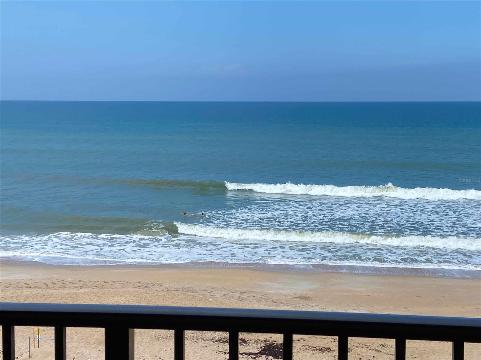 Offered is a much sought after 3BR 2 BA condo with 2 underground parking spaces in the gated Moontide condominium complex. The Moontide complex is ideally situated on the no drive, uncrowded, quiet section of New Smyrna Beach – a peaceful setting to play in the sand and enjoy the cool ocean waters. This condo home is located on the top floor of the oceanfront “A” building. Enjoy the sights and sounds of a families’ day at the beach with the inherent privacy of the 5th floor elevation. This condo can serve both as a vacation rental (passive income) or permanent residence. Moontide’s location is pristine and convenient to all of New Smyrna Beach. One can walk to a nearby market offering multiple restaurants, general store, nail salon, and a beach wear store. The Flagler Ave. restaurant, bar, and shopping area is a mere 5 minute drive. The condo is a turn-key, fully furnished home offering a split bedroom open floor plan with very spacious bedrooms. Spectacular ocean views are provided throughout the unit with wall-to-wall, floor to ceiling impact glass sliders in both the living room and master bedroom. Wall to wall flooring is provided everywhere with beautiful travertine look ceramic tile. Both the master and 2nd bedrooms are King suites, with the 3rd bedroom furnished with twin beds. The oceanfront balcony extends the full width of the condo. Leaving the sliders open in the MBR, one can enjoy falling asleep and waking up to the sound and sight of lapping ocean waves. The condominium home was renovated during 2017-2018 with all new furniture, new kitchen with pullout soft-close wood cabinets and quartz countertops. The MBR has a new cabinet with quartz countertop, with a tiled walk-in shower. Stainless steel appliances are provided. All bedrooms have large closets with mirrored doors. One large, private owner’s closet is provided in the MBR, and a second smaller owner’s closet is located in the 3rd BR. (See Attachment For Complete Information) ;LocationDescription: Condo ;Water: City