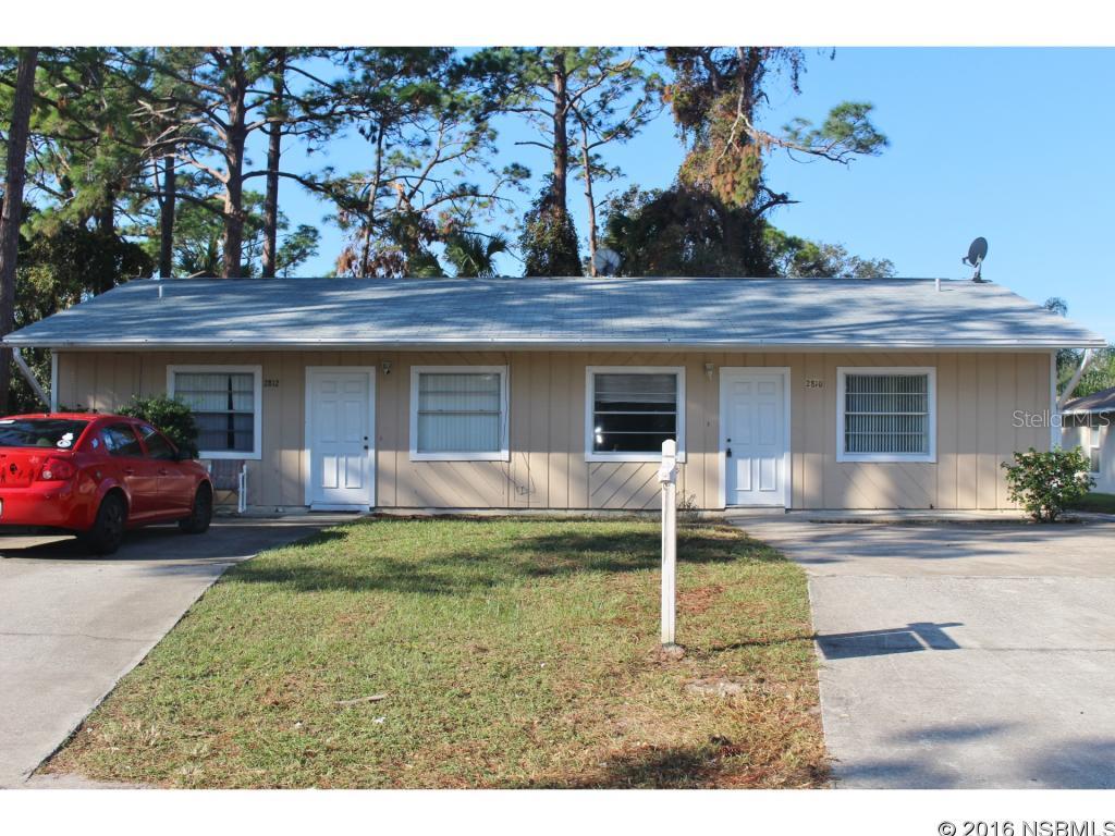 Under contract taking backups. Recently remodeled duplex centrally located in Florida shores.  Remodeled with new tile, newer appliances, newer cabinets.  New roof.  Left side occupied with long term tenant.  Do not disturb tenant.