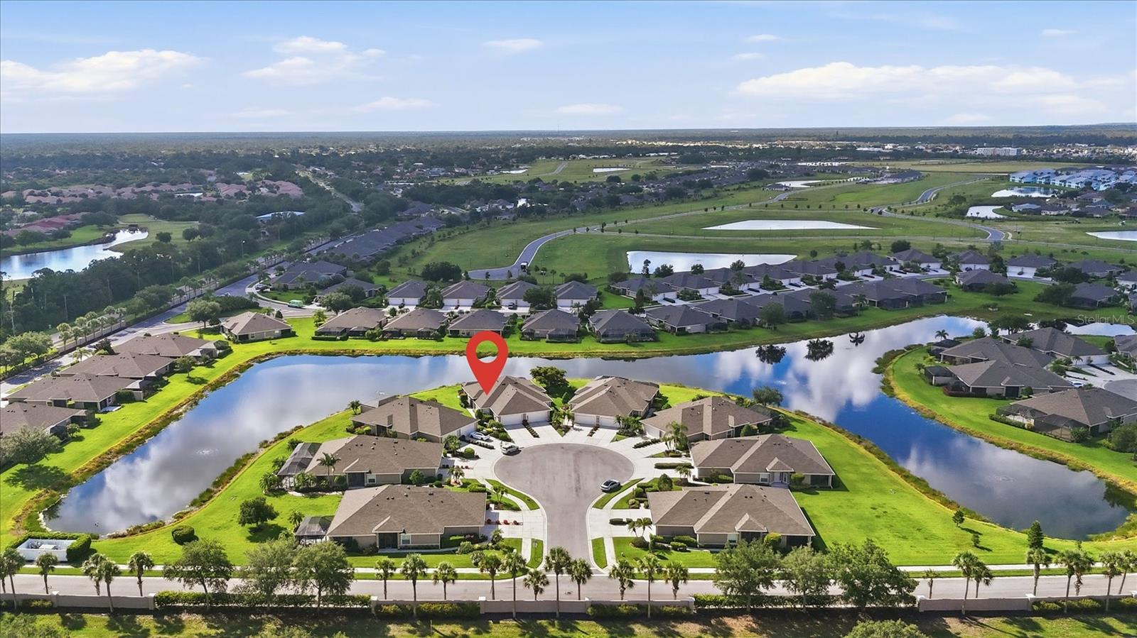 Picture yourself having your morning beverage in a comfy chair on the lanai looking out over this beautiful, peaceful pond with Egrets and water fowl. This 3 bedroom condo has an open floorplan with warm neutral colors to match any funishings. Inside laundry room with an attached large storage room. Speaking of storage, this is every Floridian's dream, lots of closets and cabinets! You will love this friendly community, with a clubhouse and inviting community pool. Sabal Trace is located near Wellen Park where you can attend ball games, farmer's market, musical events, etc. Costco is just down 41, as well as, Publix, medical offices, shopping and restaurants. A new hospital is also in planning stages. Hurry to this villa, so you can make it yours.
