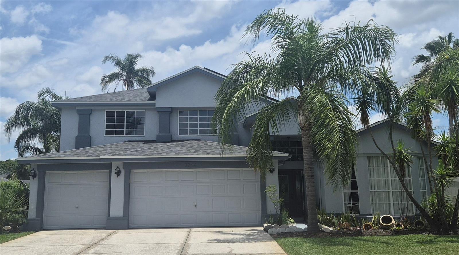 Welcome to your private oasis in the heart of Hunter's Creek! Located in one of Orlando’s most sought-after communities with top-rated schools, this beautifully updated home offers the perfect blend of comfort, convenience, and resort-style living. Step inside to a spacious open floor plan featuring 4 bedrooms and 2.5 bathrooms, ideal for both everyday living and entertaining. The modern kitchen boasts granite countertops, stainless steel appliances, a kitchen island, and plenty of space to gather. Step outside to your backyard paradise—complete with an outdoor kitchen, fenced yard, mature fruit trees, and a rare "3 pools in one" setup including pool heater. Whether you're hosting or relaxing, this backyard is built for year-round enjoyment. Notable upgrades include a new A/C system, pool pump, pool heater, water heater, energy- efficient solar panels, and a brand new roof. Buyer must assume loan on solar panels, ensuring you will never have to pay for electricity again! Enjoy the convenience of walking to nearby shops, restaurants, and everything in Hunter’s Creek. This is more than just a home—it’s a lifestyle. Don’t miss out—schedule your private tour today! Seller offers at closing $10,000 for more upgrades and $5,000 for closing costs,