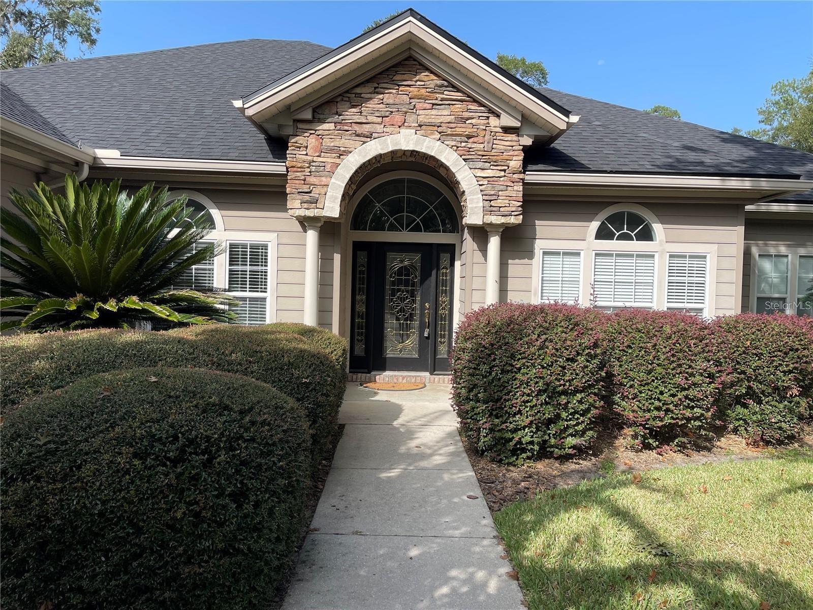 Gorgeous and tastefully updated split plan home in the gated community of Breckenridge. Open concept with an extra room that can be used as an office, generously-sized bedrooms with walk-in closets, and high ceilings add to the spacious feel of the home. Enjoy the wooded view of the backyard from the screened-in porch. Lawncare included!