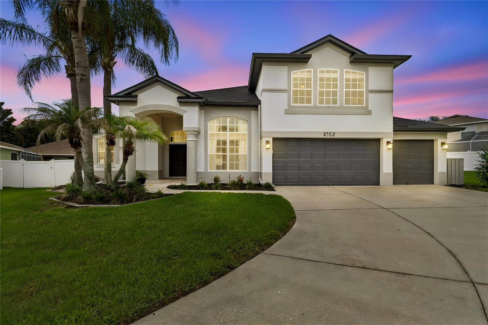 This remarkable residence is situated in a cul-de-sac within the highly sought-after gated Eastmonte community, recognized as one of the most desirable neighborhoods in the area. The home boasts 5 bedrooms, an office, and 4.5 bathrooms. It is positioned on an expansive lot and features a 3-car garage. The kitchen is a chef's dream, outfitted with a gas range (2019) and two pantries.  The open floor plan provides views of the newly screened lanai (2026) and the saltwater pool, making it perfect for entertaining. The spacious bonus room upstairs, which can also function as the 5th bedroom, includes a closet and an en-suite bathroom. The master bedroom features two walk-in closets.  There are views of the pool from the master bedroom, living room, and family room. Additionally, there is a fire pit in the large fenced-in backyard.  The pool pump, salt cell, and control panel were all replaced in 2017. All hardwood flooring throughout the residence was updated in 2026.  . The roof was replaced in 2020, and the property is equipped with two air conditioning units, with the top-floor unit being replaced in 2020 and the first-floor unit in 2023.
