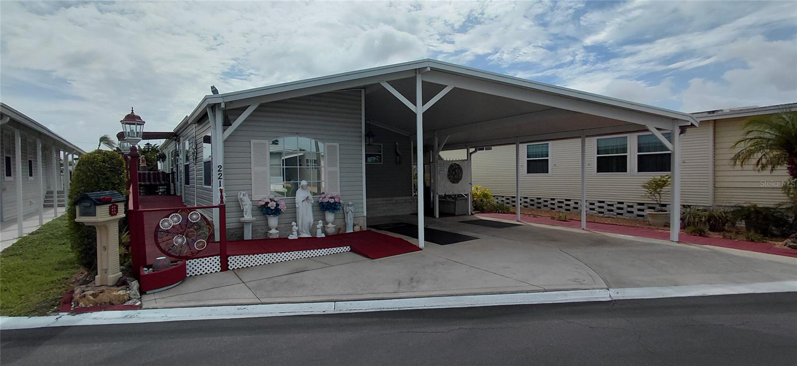 Welcome to Ranch Mobile Park in Clearwater, Florida. Just a 15-minute drive to the fine sandy beaches of the Gulf. The Ranch Mobile neighborhood and is a resident owned park (No Land Lease fees), with low $163 monthly maintenance fees, covering water, trash, sewer and use of park amenities. The home is not located in the pet portion of the park. Emotional support animals must have proper documentation. 

This 2002 Disabled Accessible home offers a thoughtfully designed split floor plan featuring vaulted ceilings and a spacious, open-concept living and dining area, galley kitchen. The layout includes 2 bedrooms, 2 bathrooms, and a versatile 9’ x 11’ studio/den—the perfect sanctuary for creative pursuits, a professional home office, or a quiet retreat. Enjoy a private back patio and the peace of mind that comes with modern updates. Partially furnished.

Full Accessibility: Built with ease of movement in mind, featuring a sturdy entry ramp and wide, accessible doorways throughout the interior.

High-End Flooring (2022): New Milliken industrial-grade carpet planks specifically chosen for their durability; these will hold up beautifully to any manual or power wheelchair.

Galley Kitchen: Highly functional layout featuring a brand-new refrigerator (2026).

Creative Studio/Den (9’ x 11’): A bright and inspiring space perfect for: A quiet home office, or a peaceful reading nook.

Master Suite: A generous retreat with an en suite featuring a Jacuzzi tub, separate shower, bidet, built-in vanity, and a massive 4’ x 11’ walk-in closet.

Second Bedroom: Maximizes space with a convenient Murphy bed, located adjacent to a full guest bath with a tub/shower combo.

Indoor Laundry: Equipped with a new (2026) stackable washer and dryer for modern convenience. 

Climate Control: Three new Mini-Split AC/Heat systems ensuring efficient, year-round comfort.

Modern Infrastructure:
• New Roof (2021): 35-year architectural shingles.
• New Hot Water Heater (2020): Reliable and energy efficient.
• Metal Skirting (2022): Added for superior rodent protection.

Outdoor Oasis: A private rear patio area ideal for sunbathing or entertaining, plus a 10’ x 12’ shed for seasonal storage and hobbies

The park is governed by a seven-member Board of Directors that is elected by the leaseholders of the community. The facilities here include a club house, 8 shuffleboard courts, 6 corn hole courts, 2 recreation halls, a putting green, pond, arboretum and a swimming pool with a pavilion.